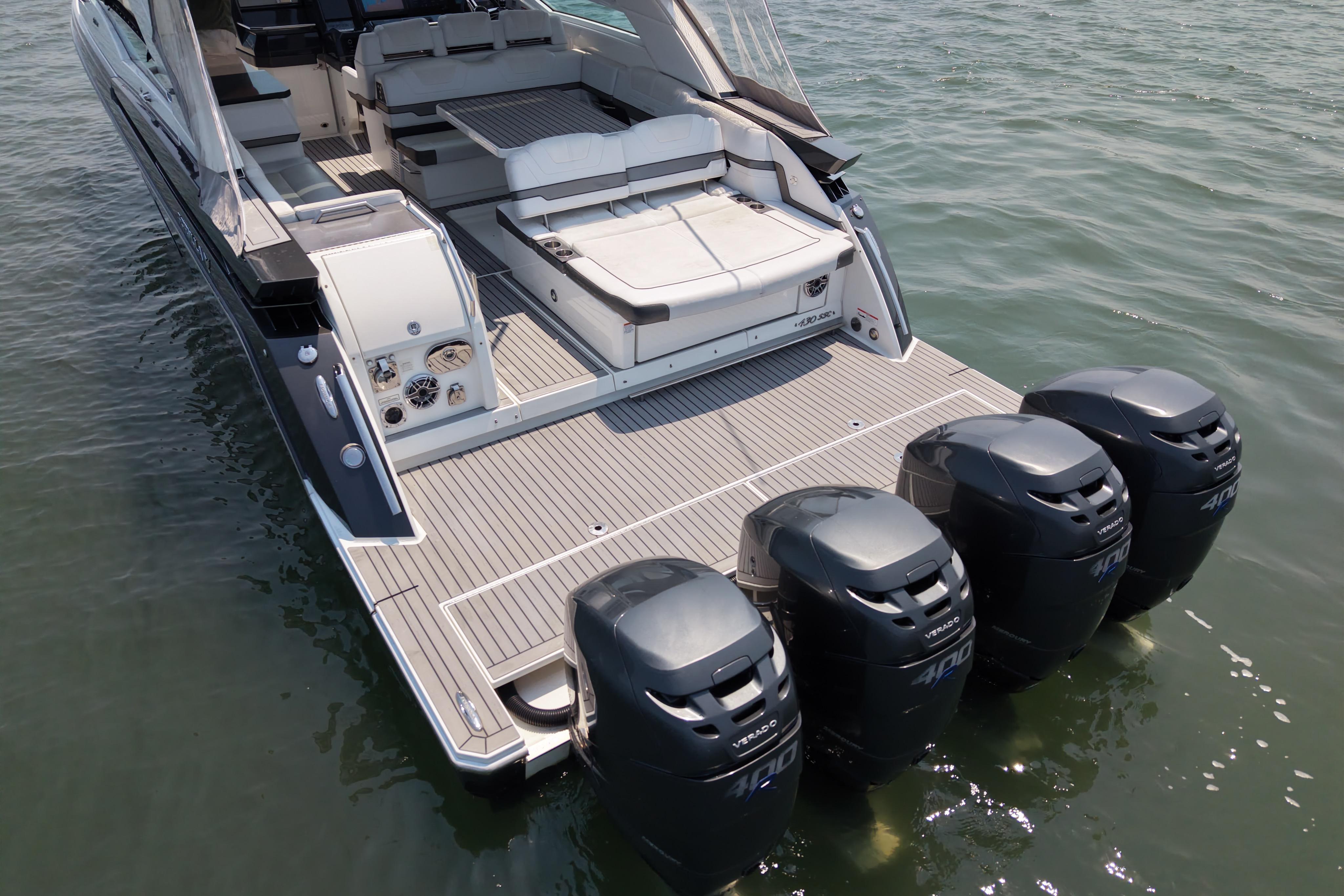 2019 Formula 430 Super Sport Crossover with four powerful outboard engines on water.