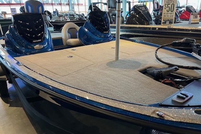 2026 Nitro Z17 boat with spacious deck and sleek design in showroom.