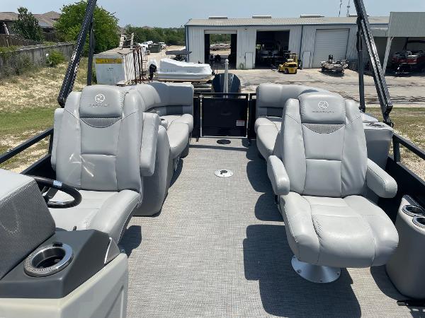 2023 Regency 250 LE3 pontoon boat with luxurious seating and modern design.