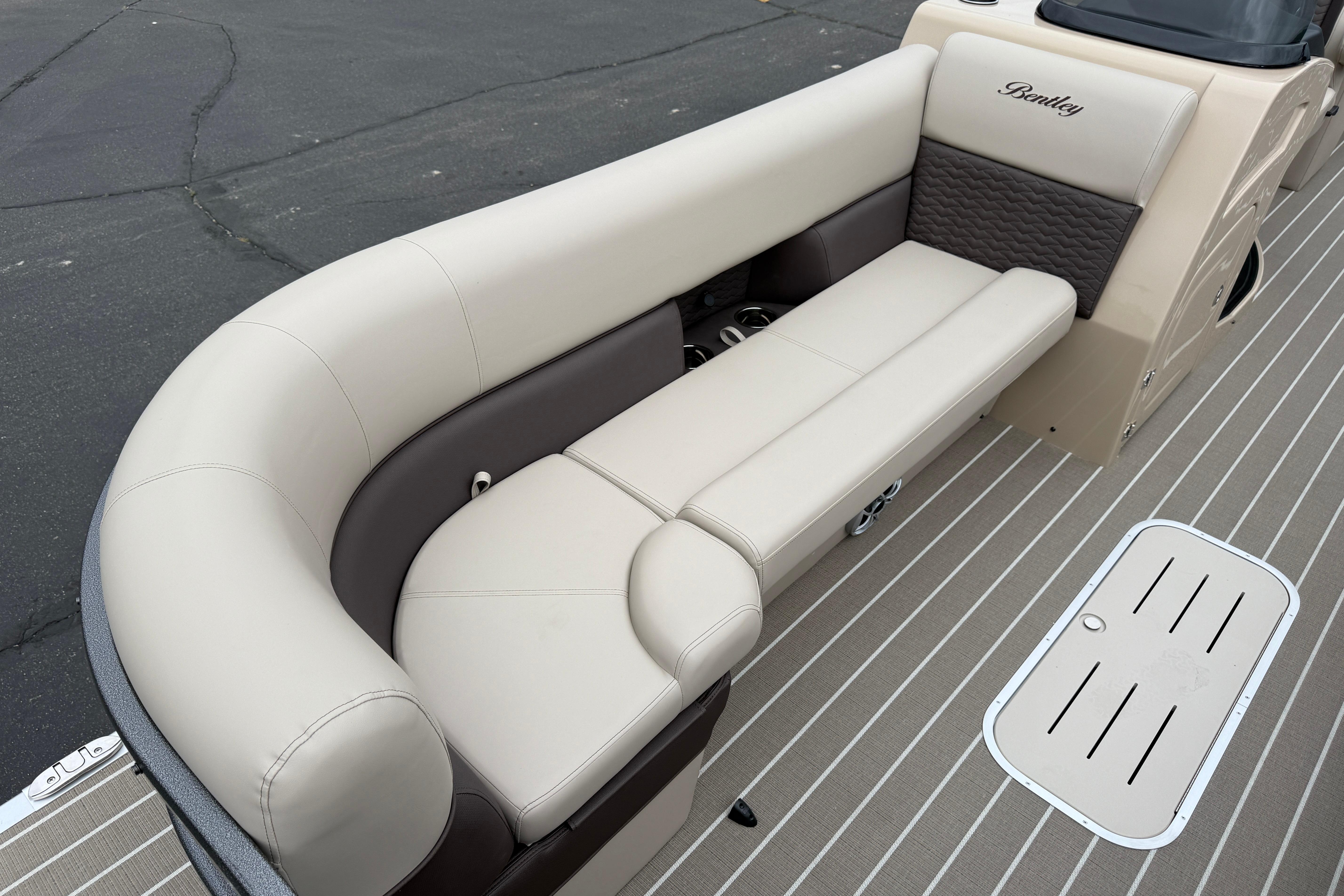 Luxurious seating on 2026 Bentley Pontoons Elite 253 Admiral, featuring elegant beige upholstery.