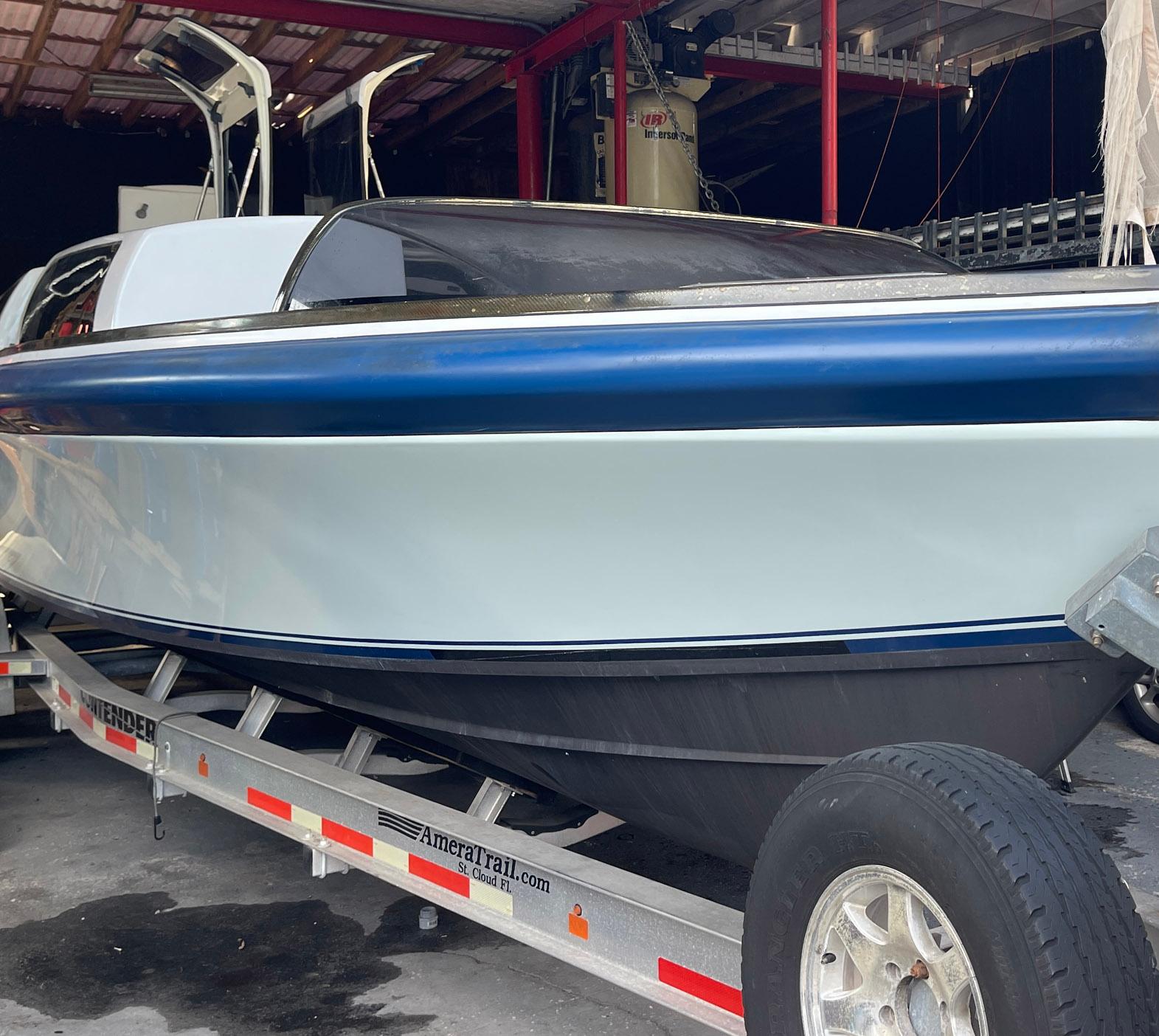 2008 Goetz Custom Boats 33' Limo Tender on trailer in storage facility.