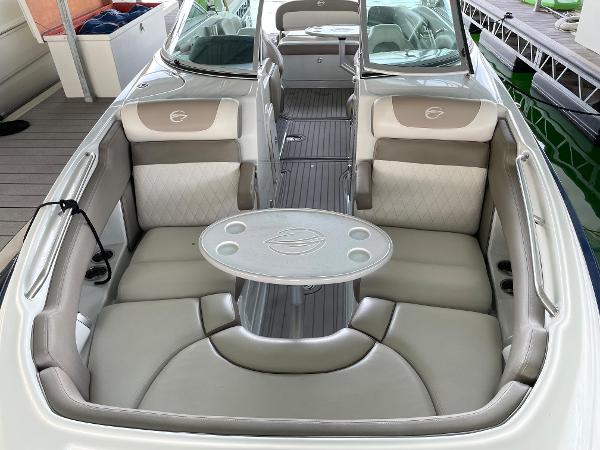 2019 Crownline E255 boat interior with spacious seating and table.
