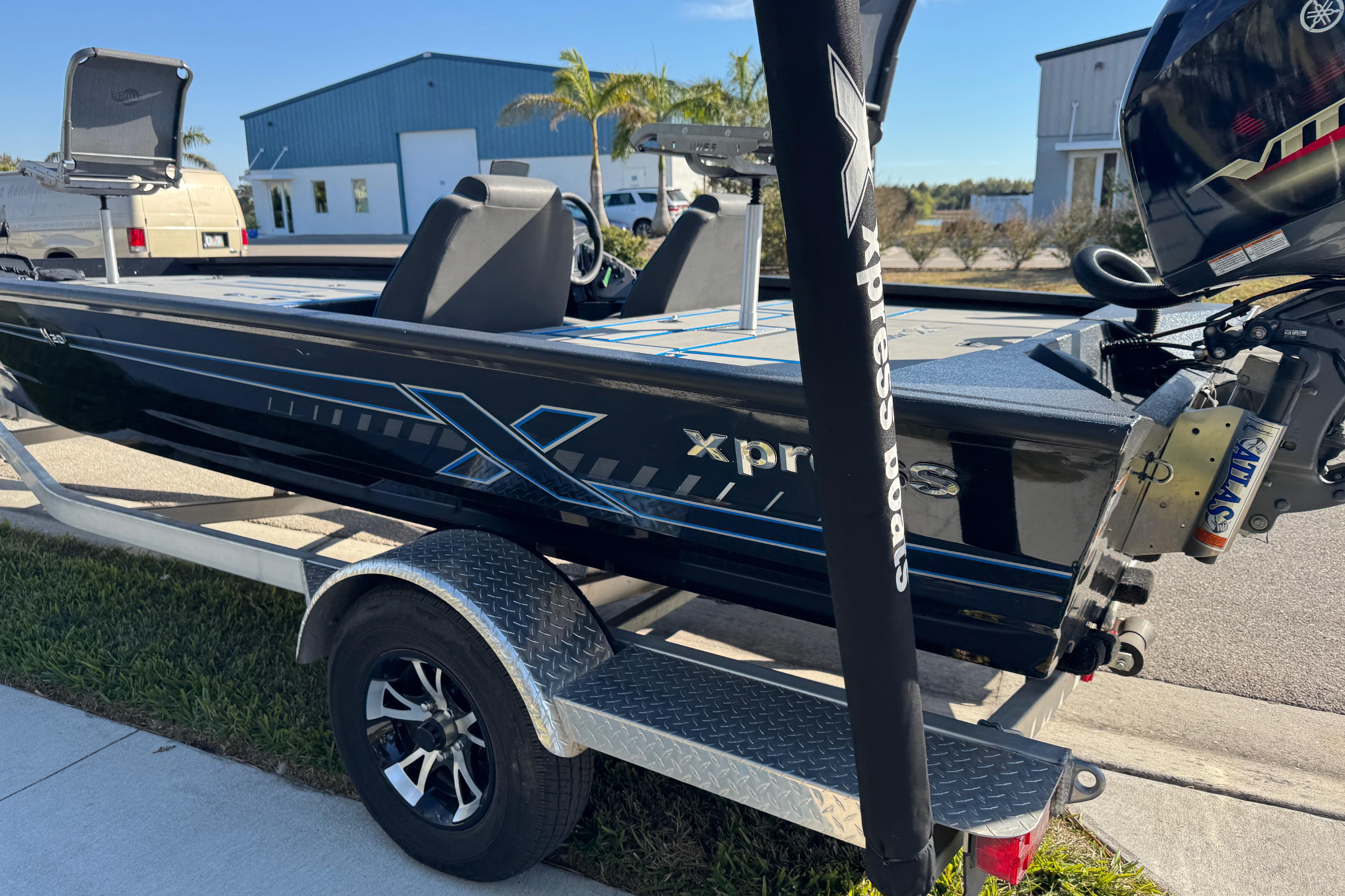 2025 Express H20 boat on trailer, featuring sleek design and Yamaha motor.