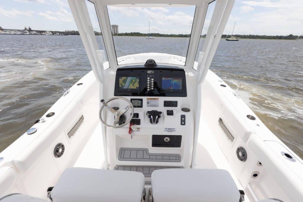 2027 Sea Fox 268 Commander boat dashboard with navigation controls on open water.
