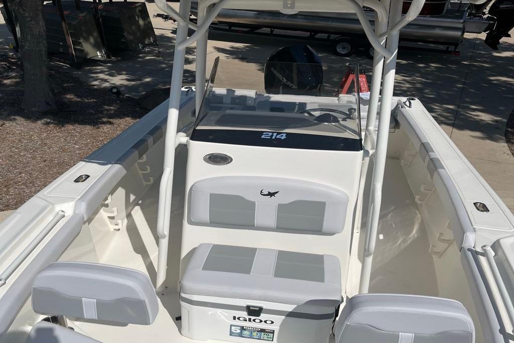2026 Mako 214 Center Console boat interior with seating and console view.