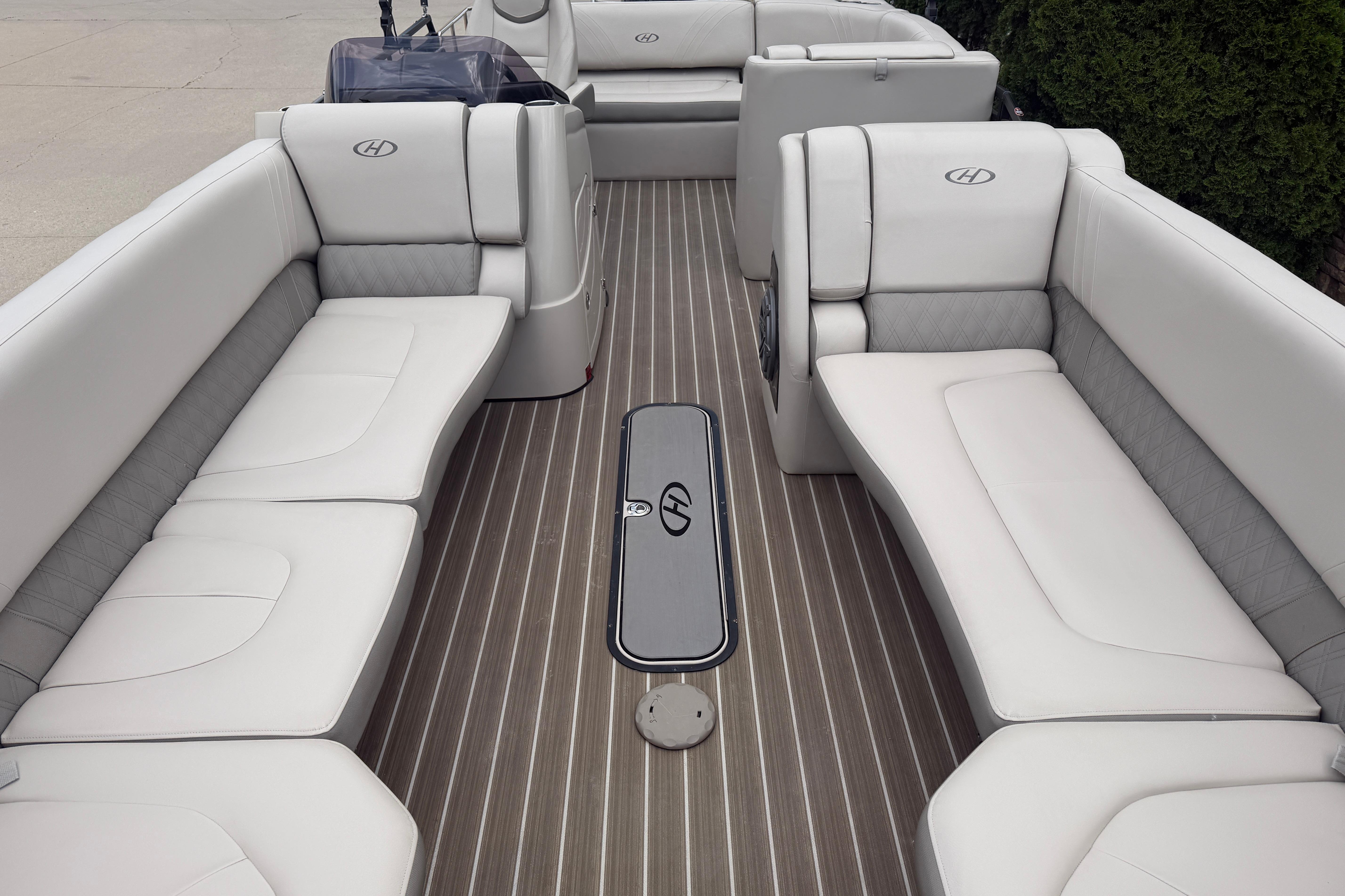 2019 Harris Solstice 240 pontoon boat interior with luxurious seating and sleek design.