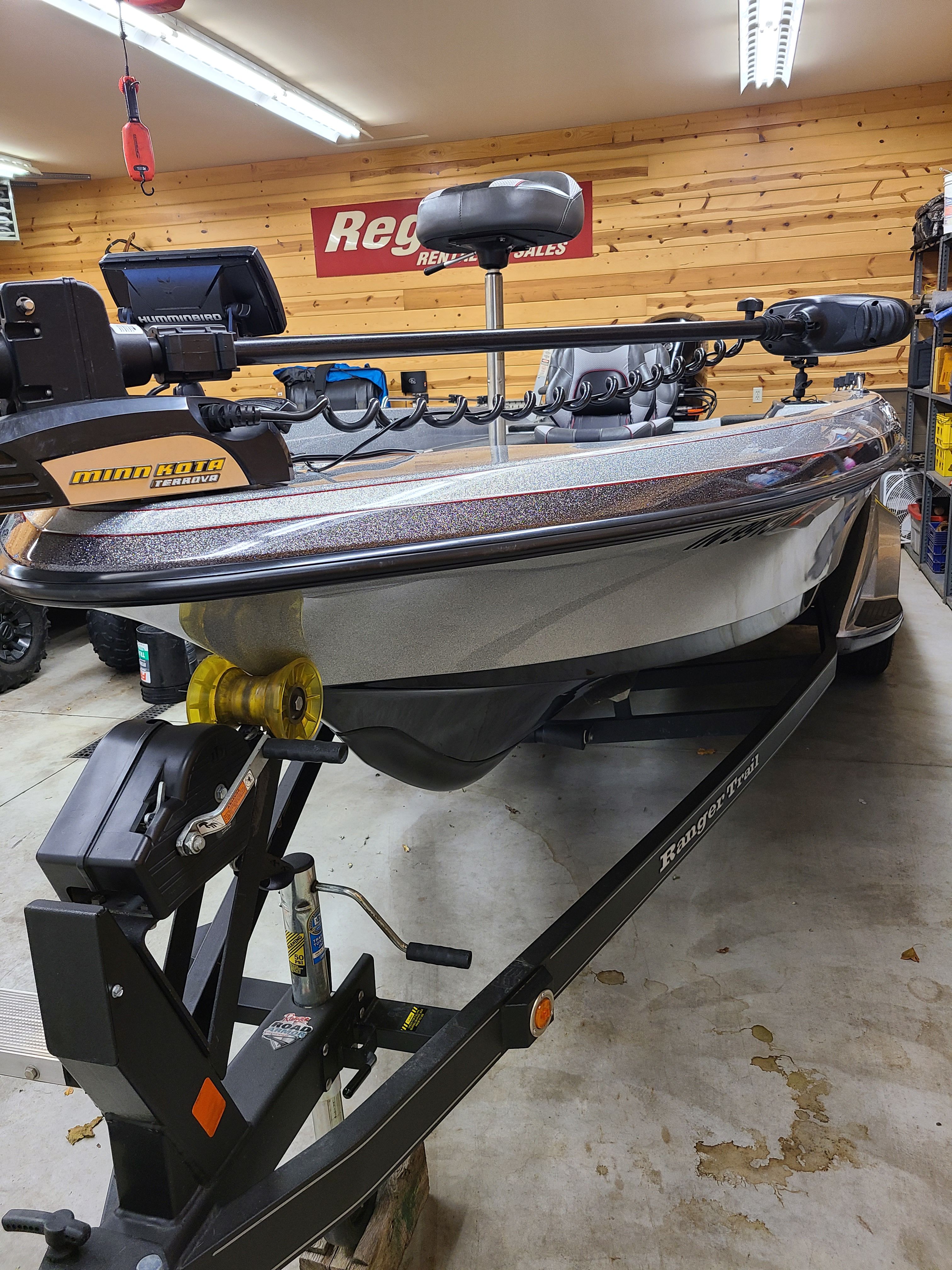 2018 Ranger 620T Fisherman boat in garage on trailer.