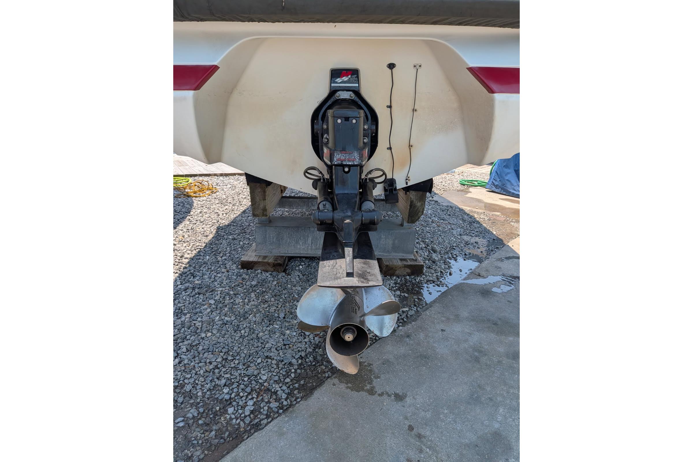 Rear view of a 2020 Cobalt 206 boat with visible propeller and outdrive.