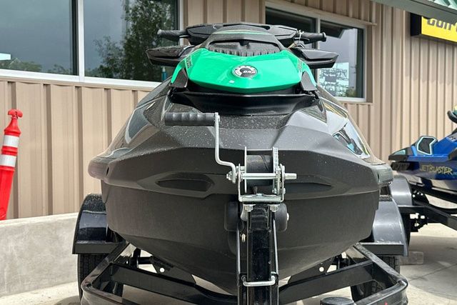 2026 Sea-Doo PWC GTR 230 on a trailer in front of a building.