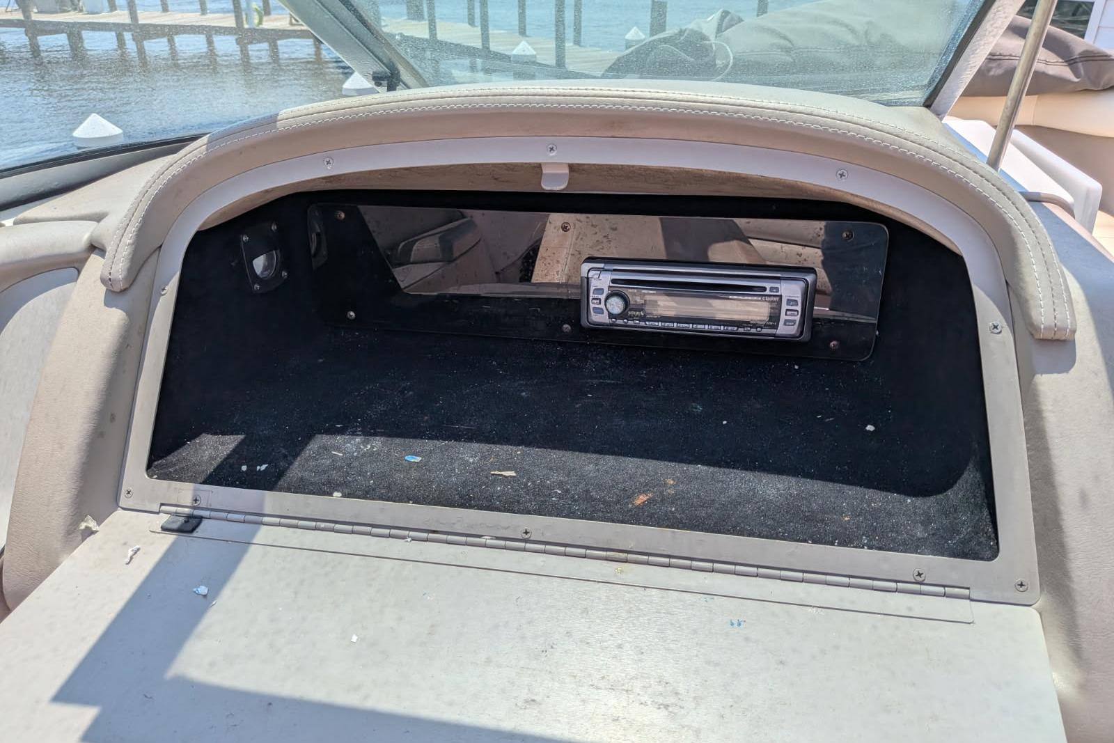 2020 Cobalt 206 boat dashboard with stereo system, dockside view.