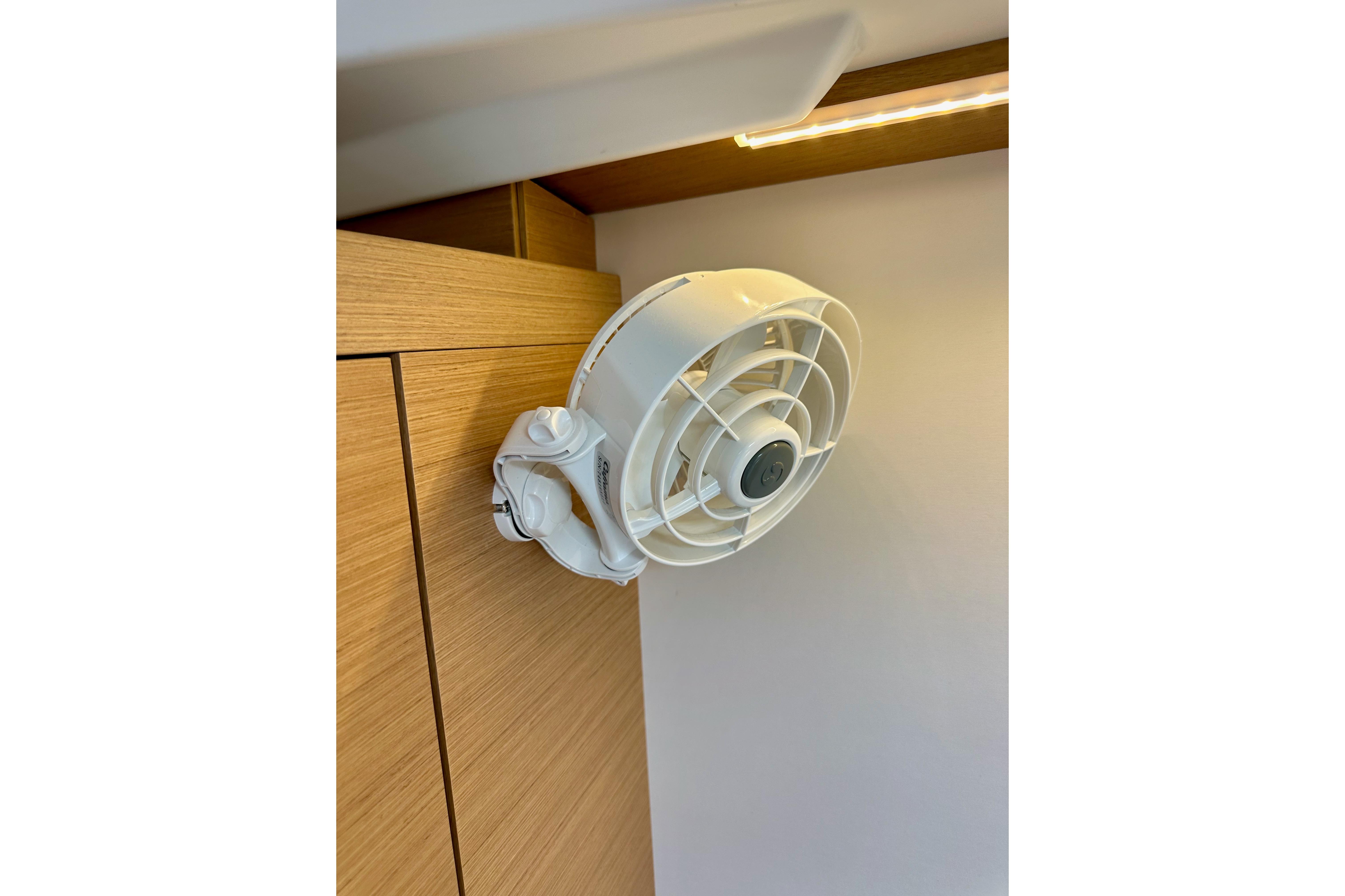 Wall-mounted fan inside 2024 Jeanneau Sun Odyssey 410 yacht cabin.