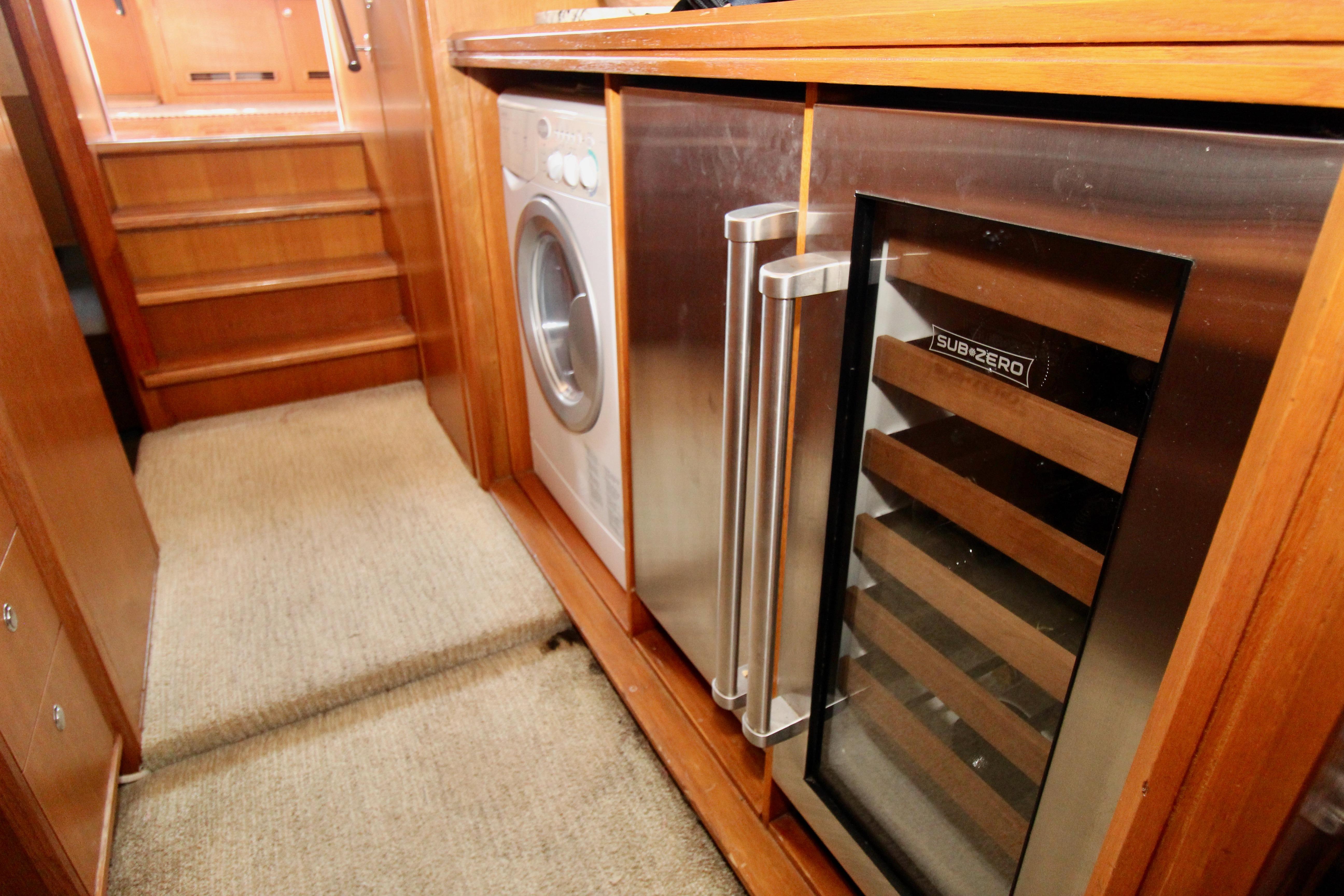 Interior of 1990 Hakvoort Motor Yacht with washer and Sub-Zero wine cooler.