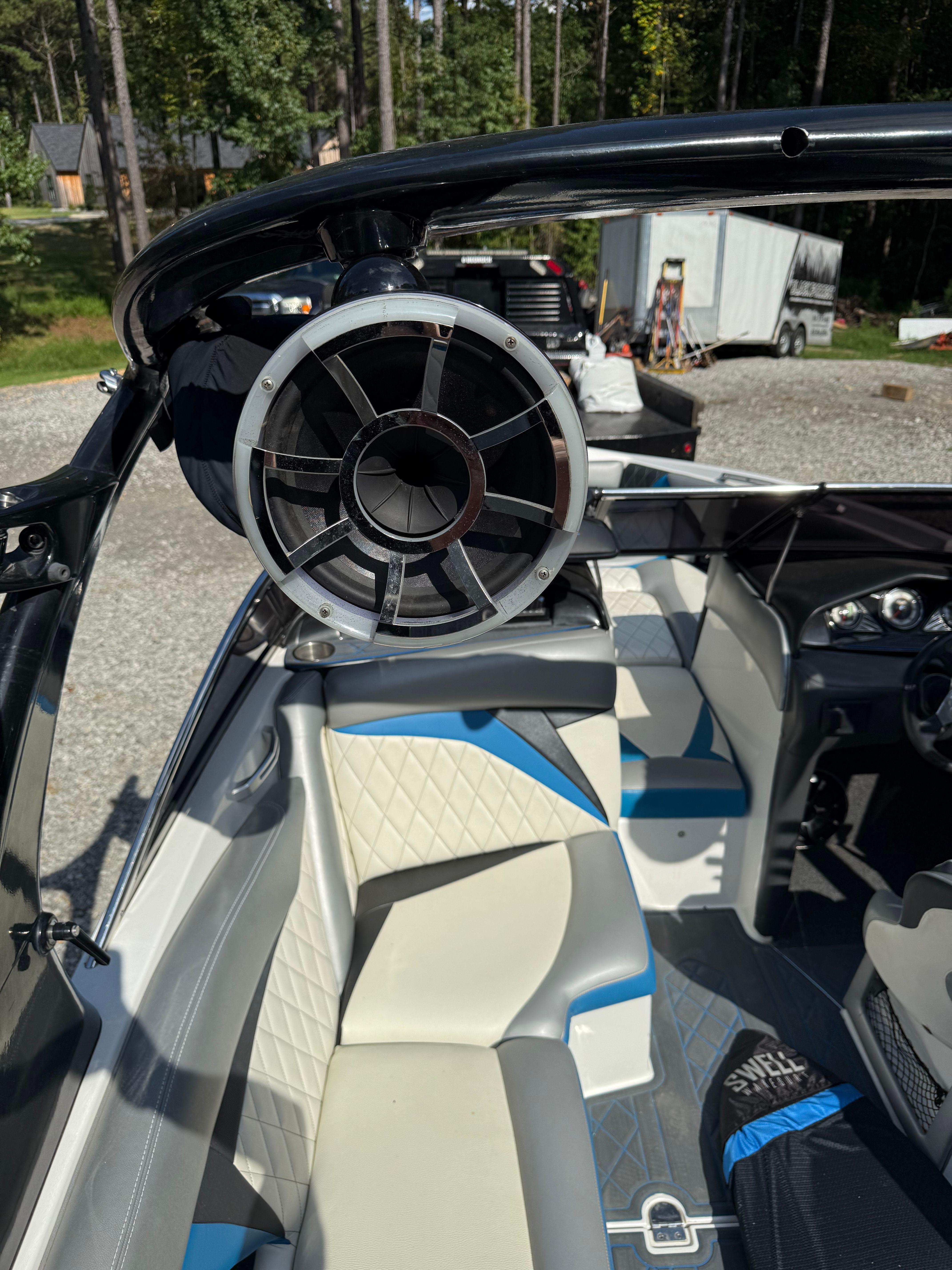 Custom Z3 boat with speaker and blue seating, year 2012.