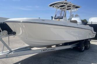 2023 Trophy T24 CC boat on trailer, sleek design, ready for adventure.
