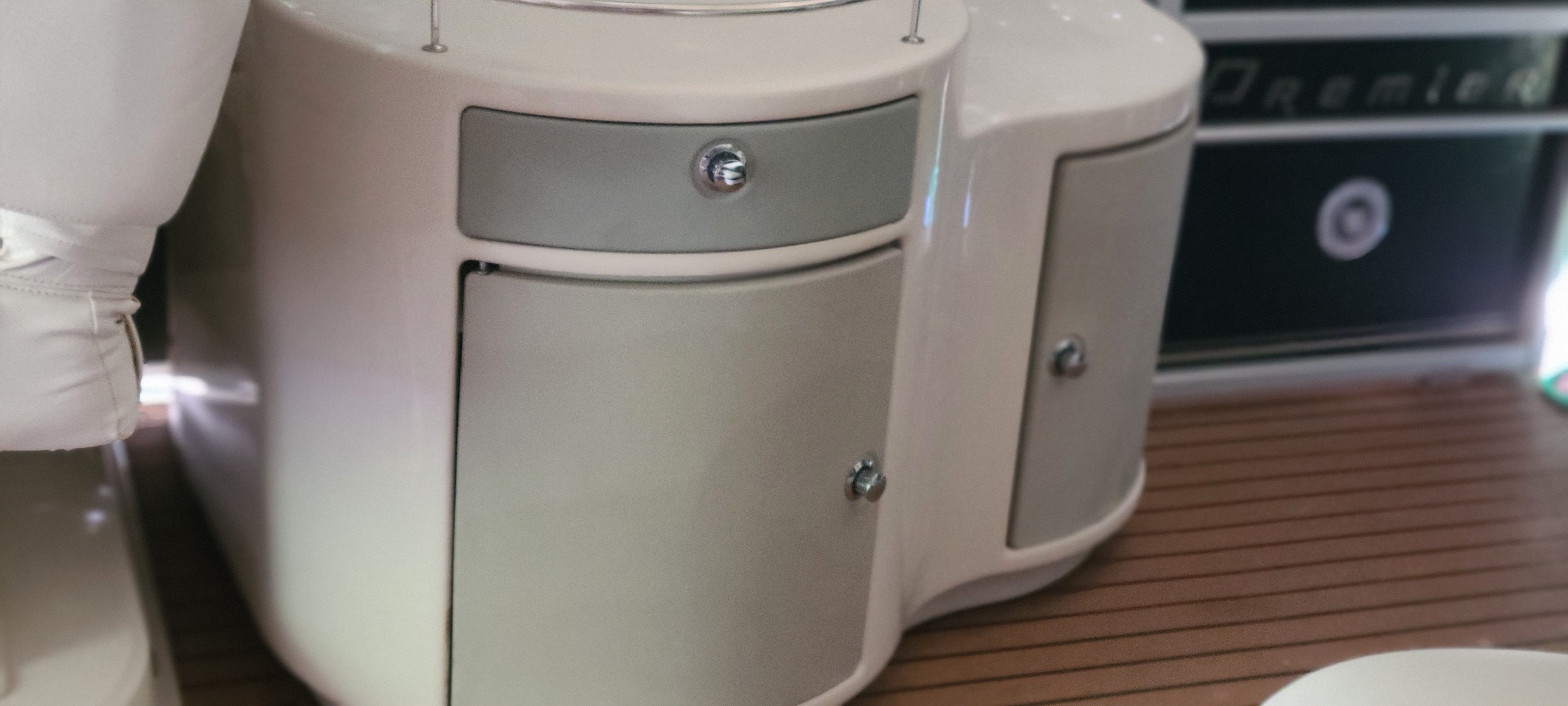 Interior of 2009 Premier 275 Grand Majestic LTD with wood accents.