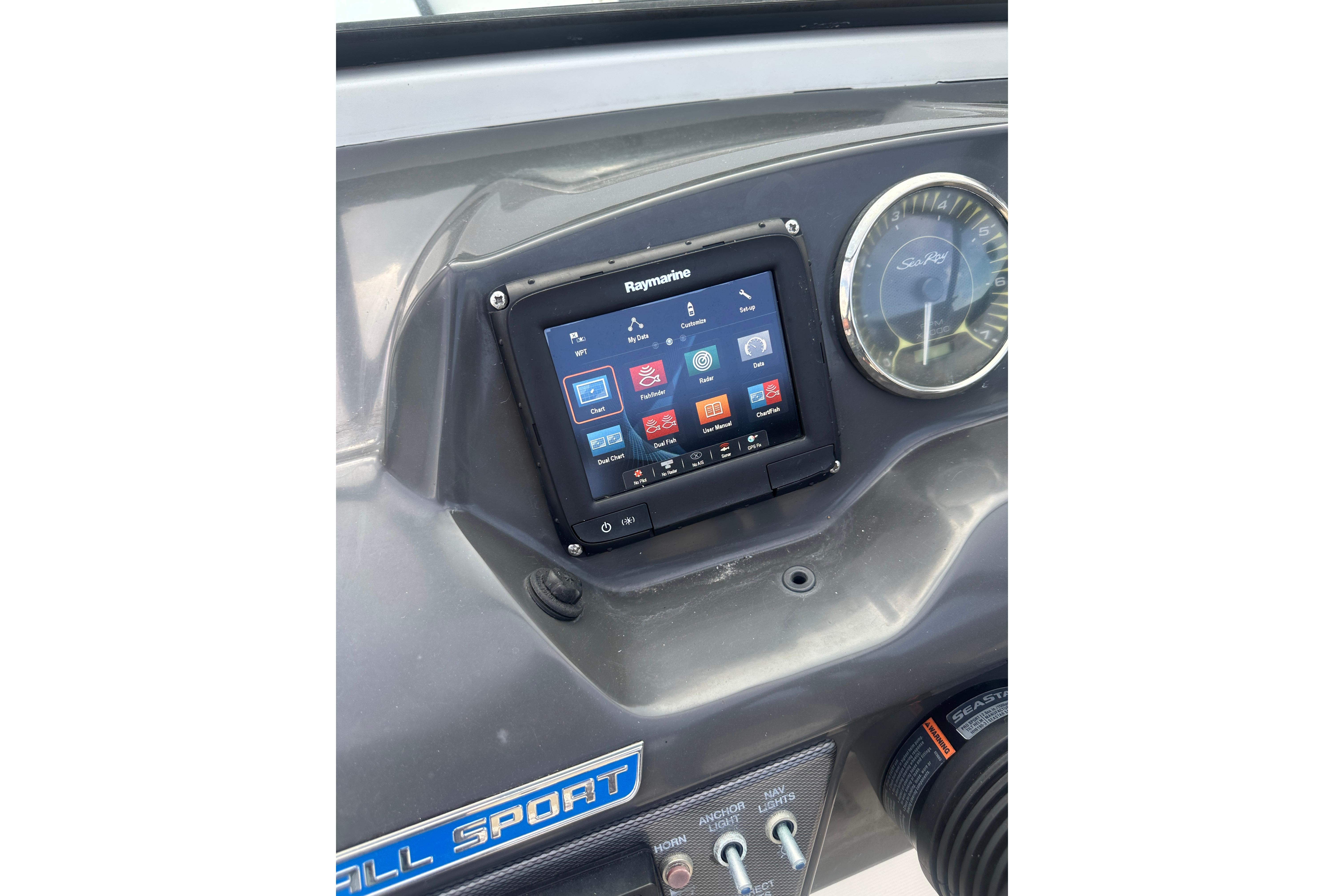 Control panel of 2017 Sea Ray SPX 190 Outboard with Raymarine display and speedometer.