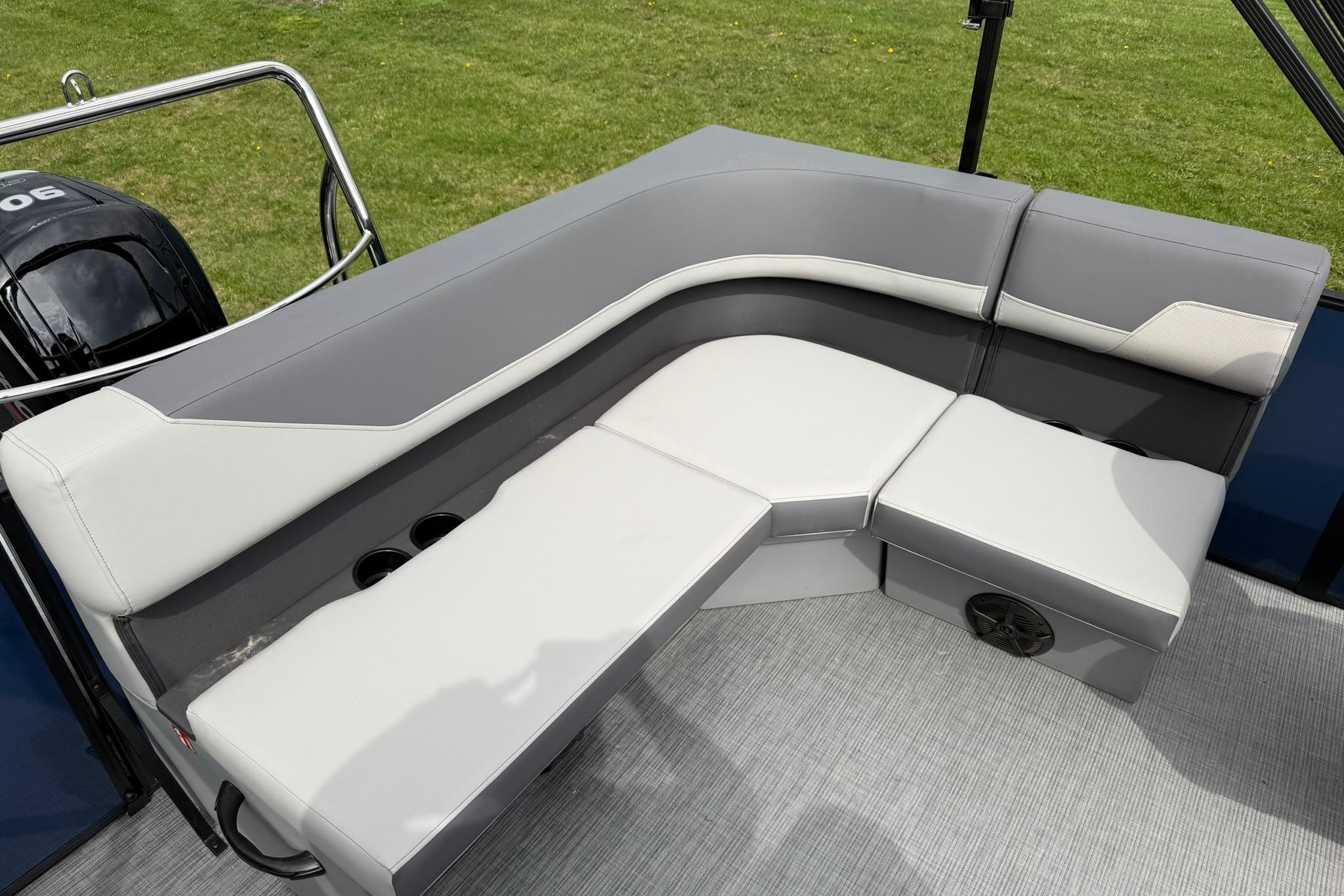 2026 Lowe LS 190 boat interior with gray seating and cup holders.