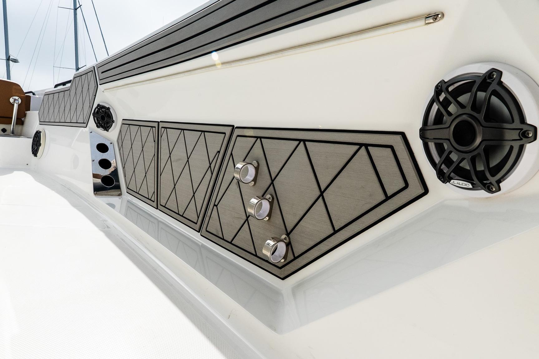 2021 Wellcraft 402 Fisherman boat interior with speakers and stylish paneling.