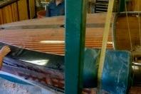 1931 Hacker-Craft 26 Dolphin boat under restoration in workshop.