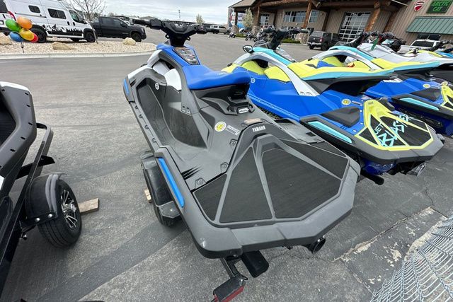 A black 2026 Yamaha WaveRunner Jetblaster on a trailer, parked next to other jet skis.