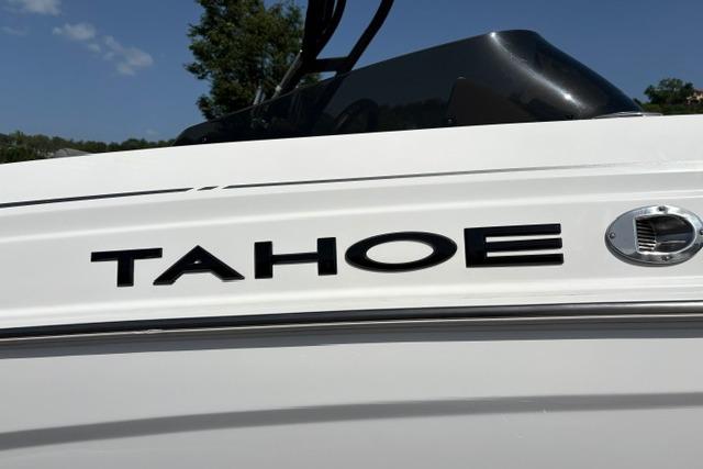 2024 Tahoe T21 boat, sleek white exterior with bold black lettering.