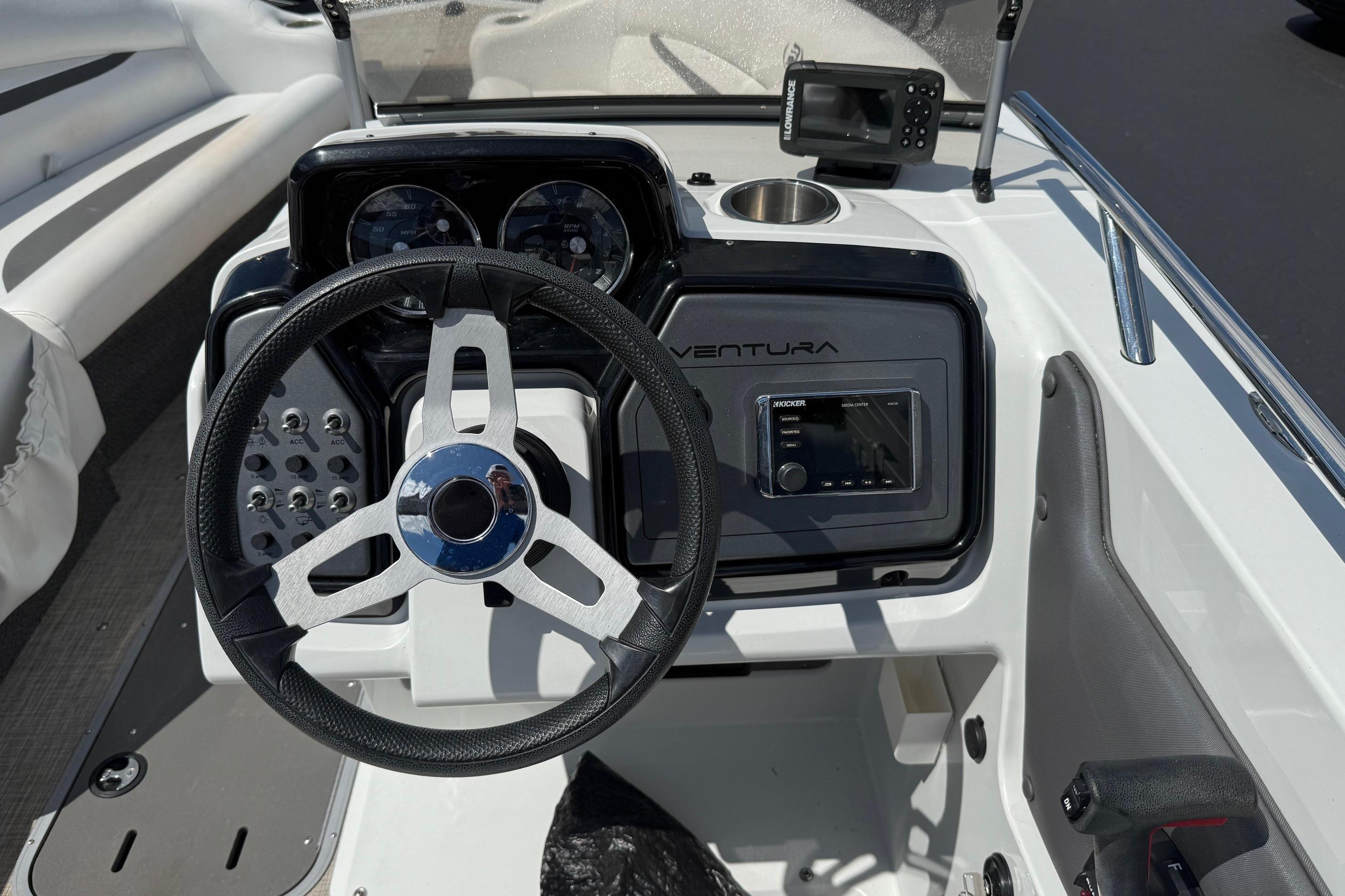 2019 Princecraft Ventura 190 boat dashboard with steering wheel and control panel.