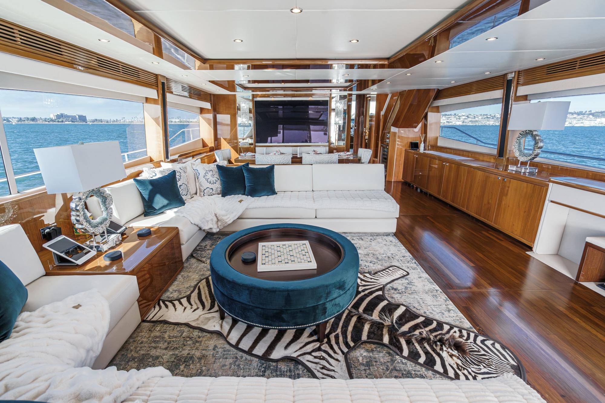 Luxurious interior of 2011 Princess 95 Motor Yacht with elegant furnishings and ocean view.