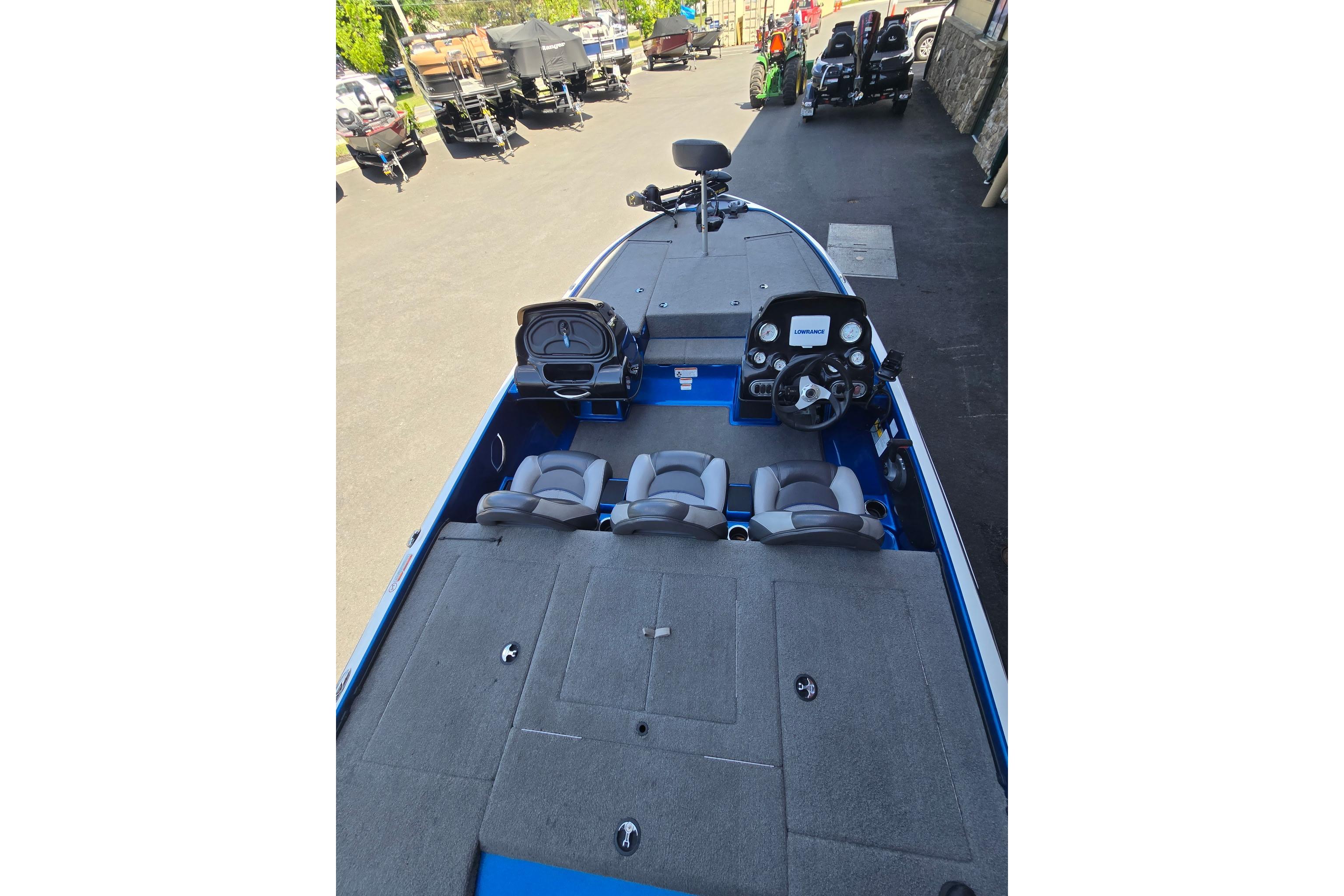 2014 Nitro Z-7 boat interior with steering console and seating.