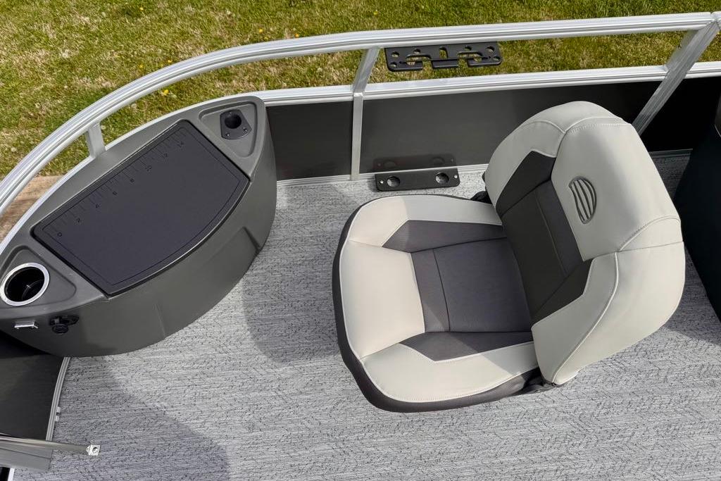 2026 Sun Tracker Bass Buggy 18 DLX boat seat and console, featuring modern design and functionality.