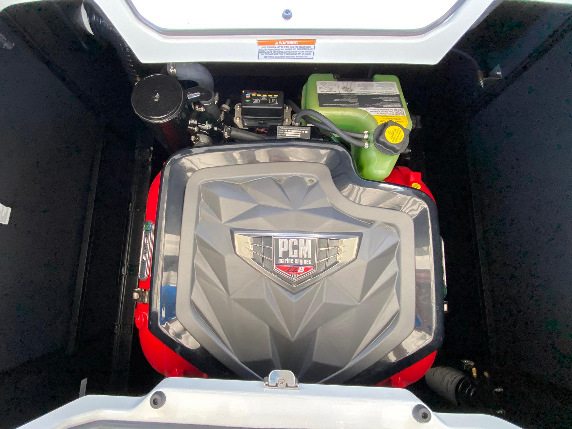 2024 Nautique Super Air Nautique G21 engine compartment with PCM engine.