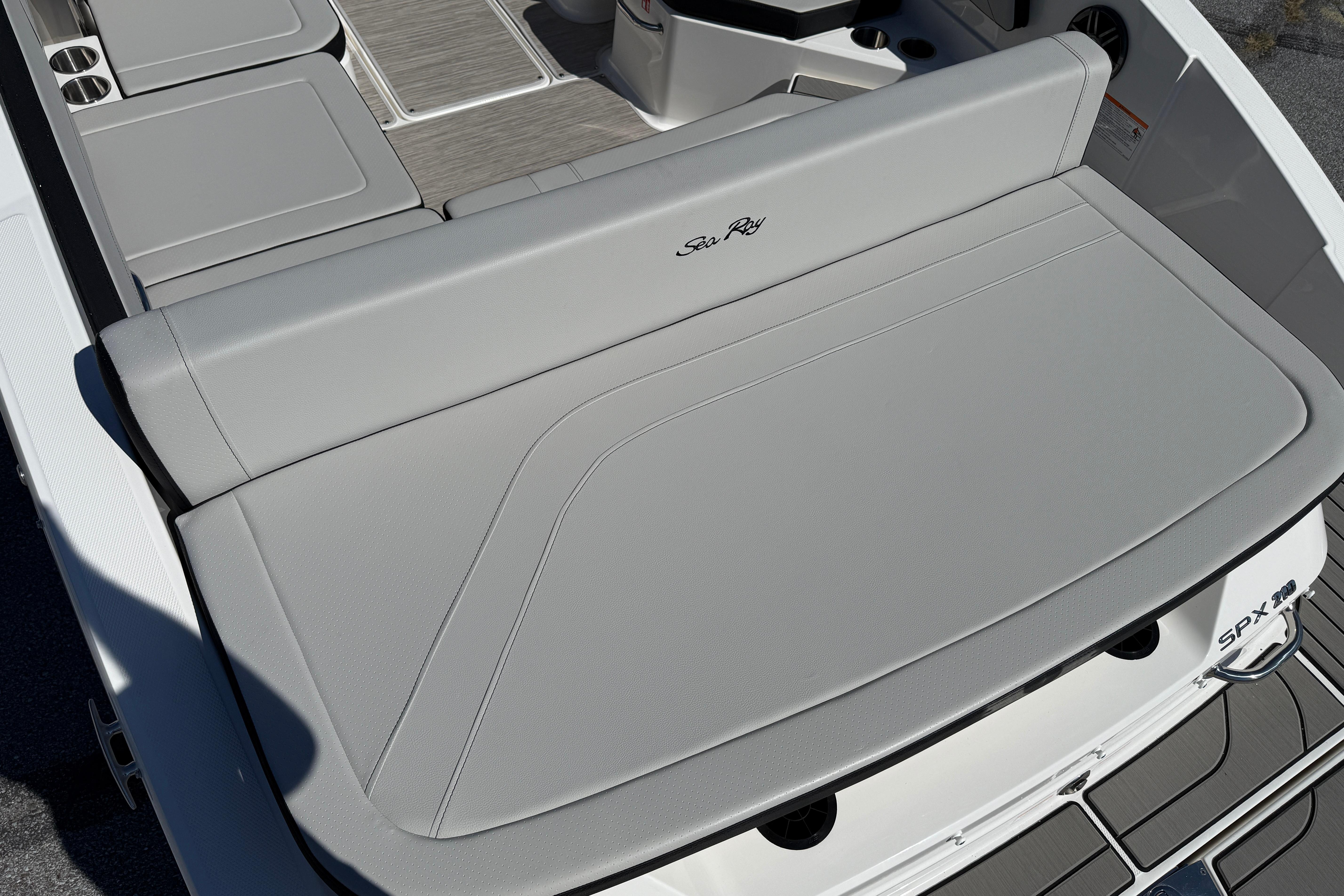 2026 Sea Ray SPX 210 boat with sleek gray seating and modern design.