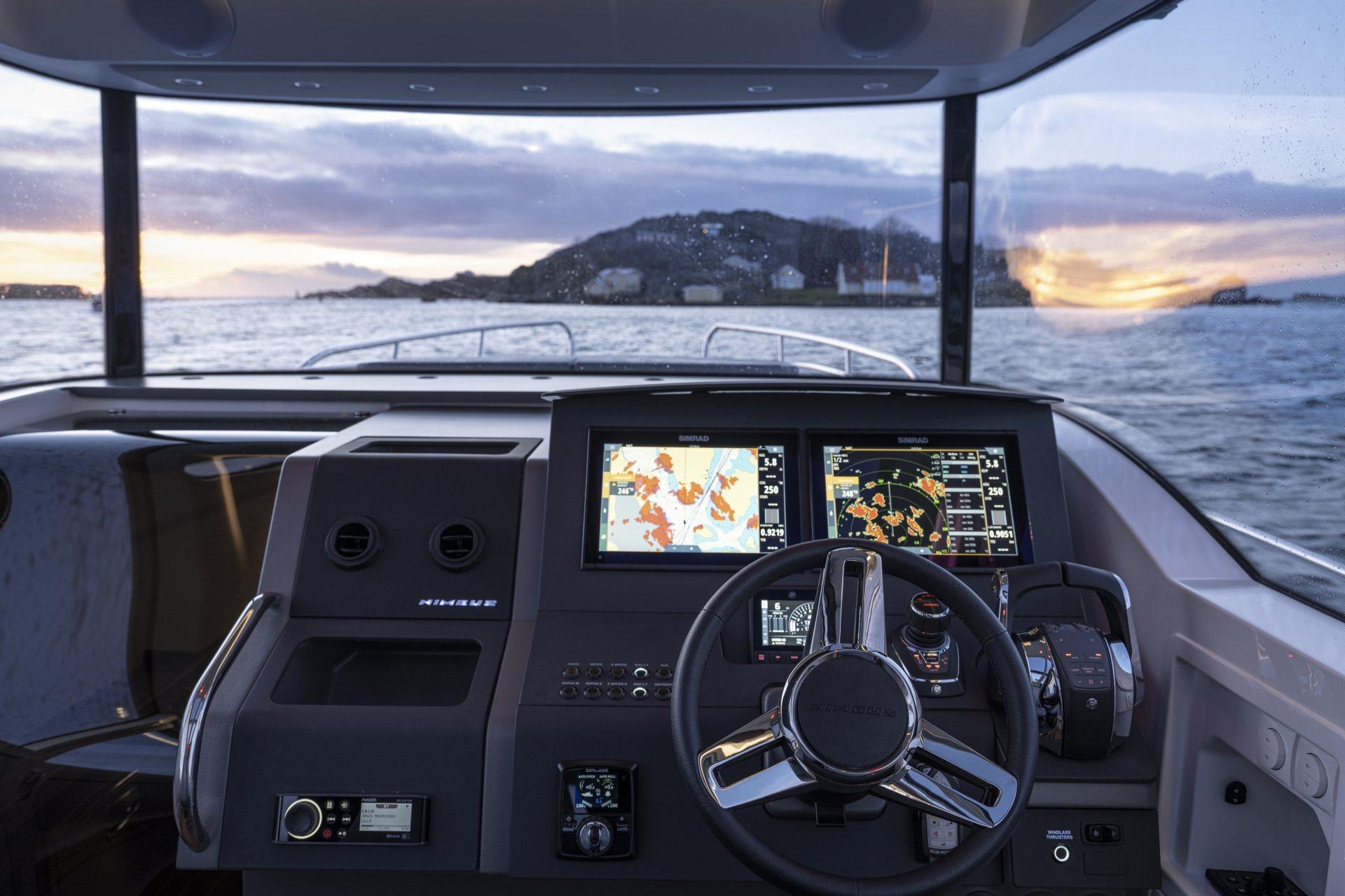 Interior view of Nimbus Commuter 11 boat, 2025 model, at sunset.