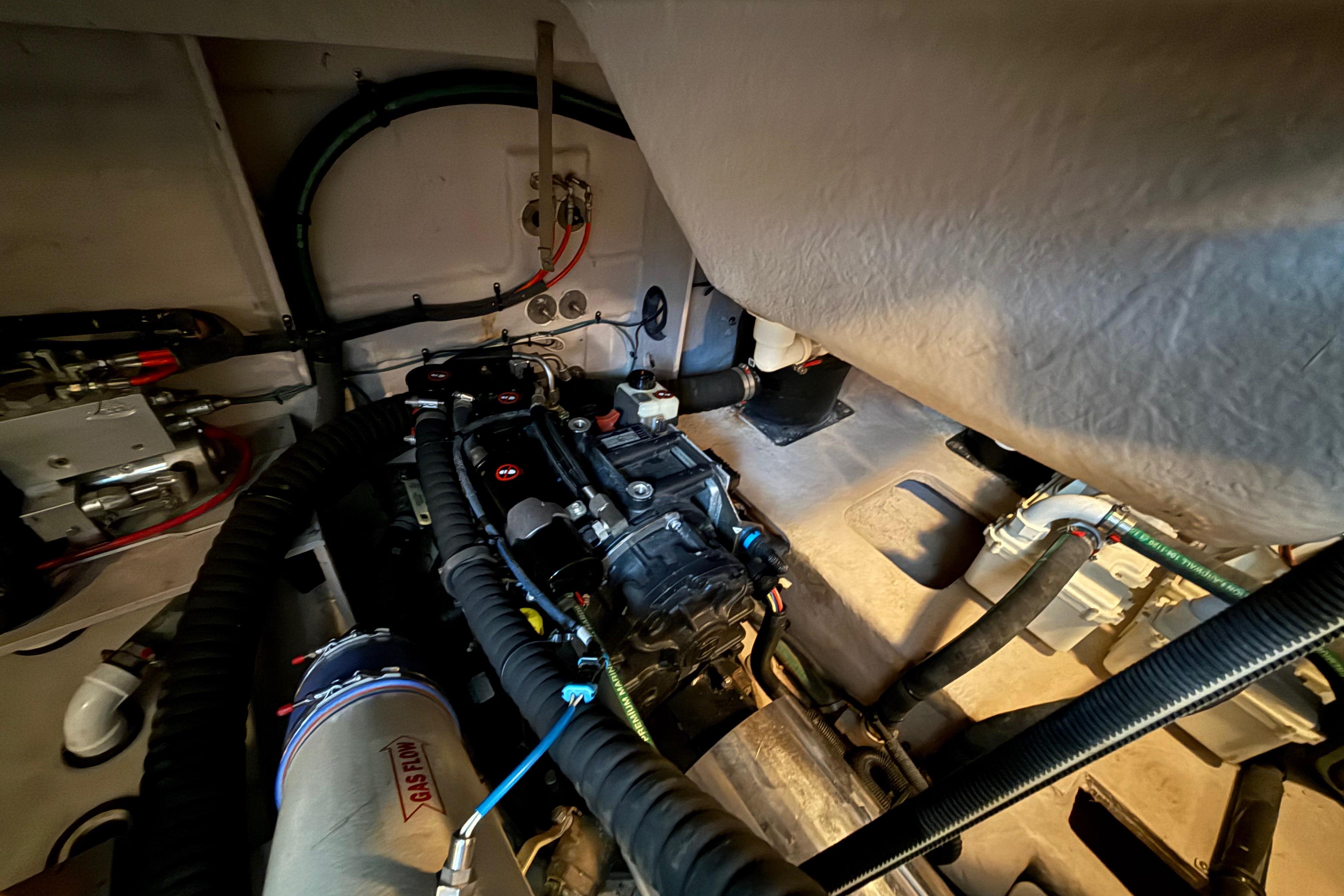 Engine room of a 2016 Sea Ray Sundancer 510 yacht, showcasing mechanical components.