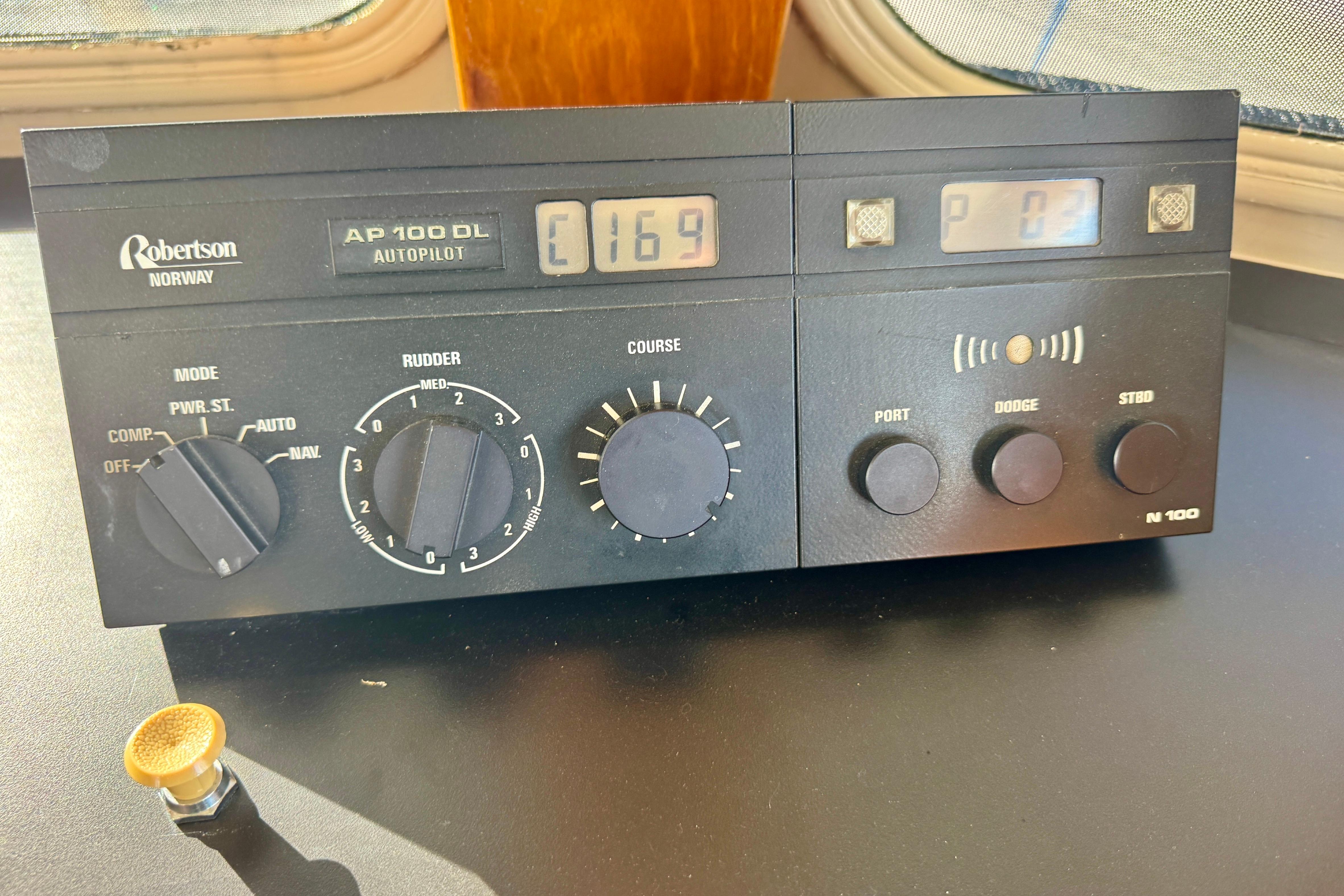 Autopilot control panel on a 1958 Blanchard Pilothouse boat, featuring Robertson AP 100 DL.