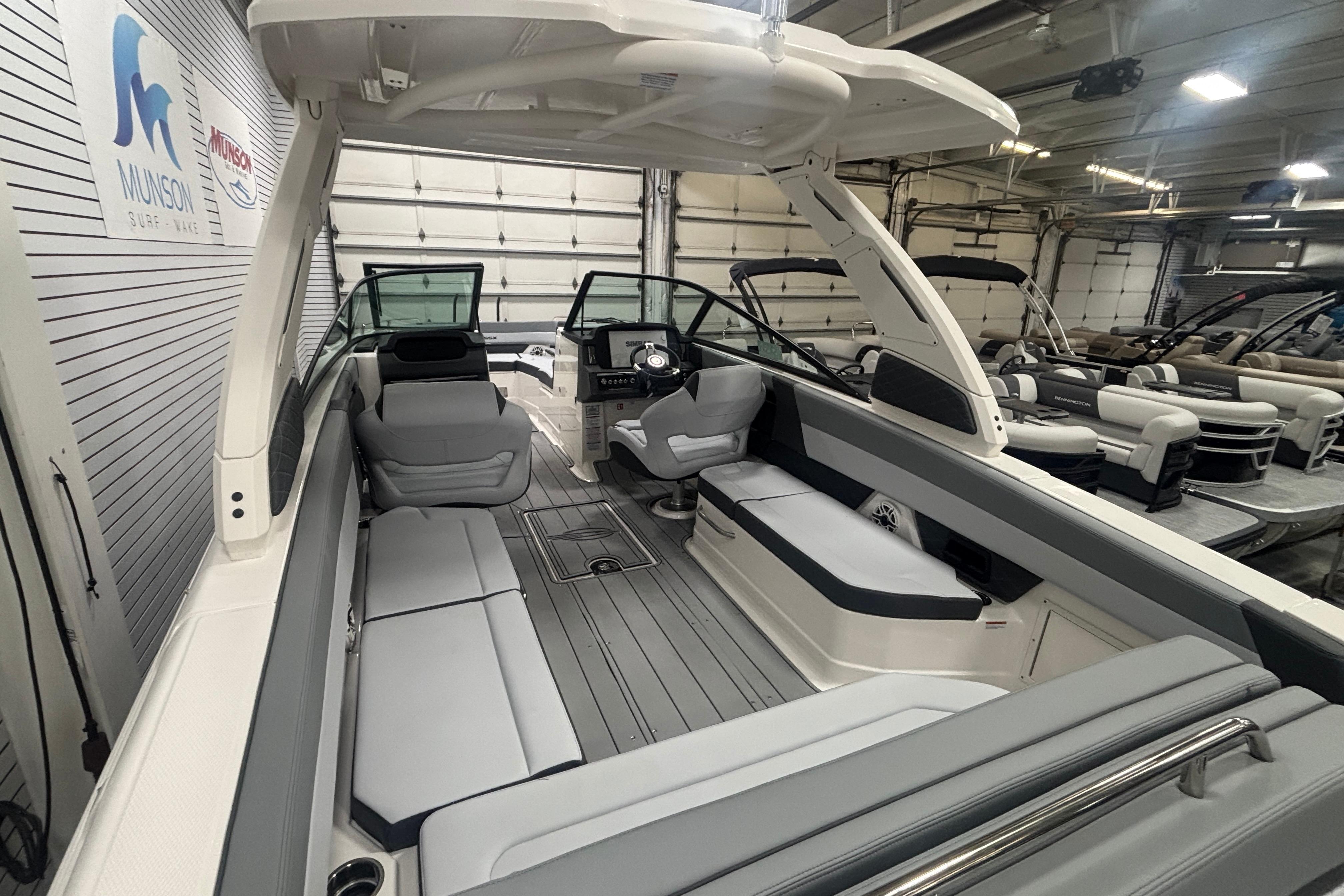 2026 Chaparral SSX 30 boat interior with sleek seating and modern design in showroom.
