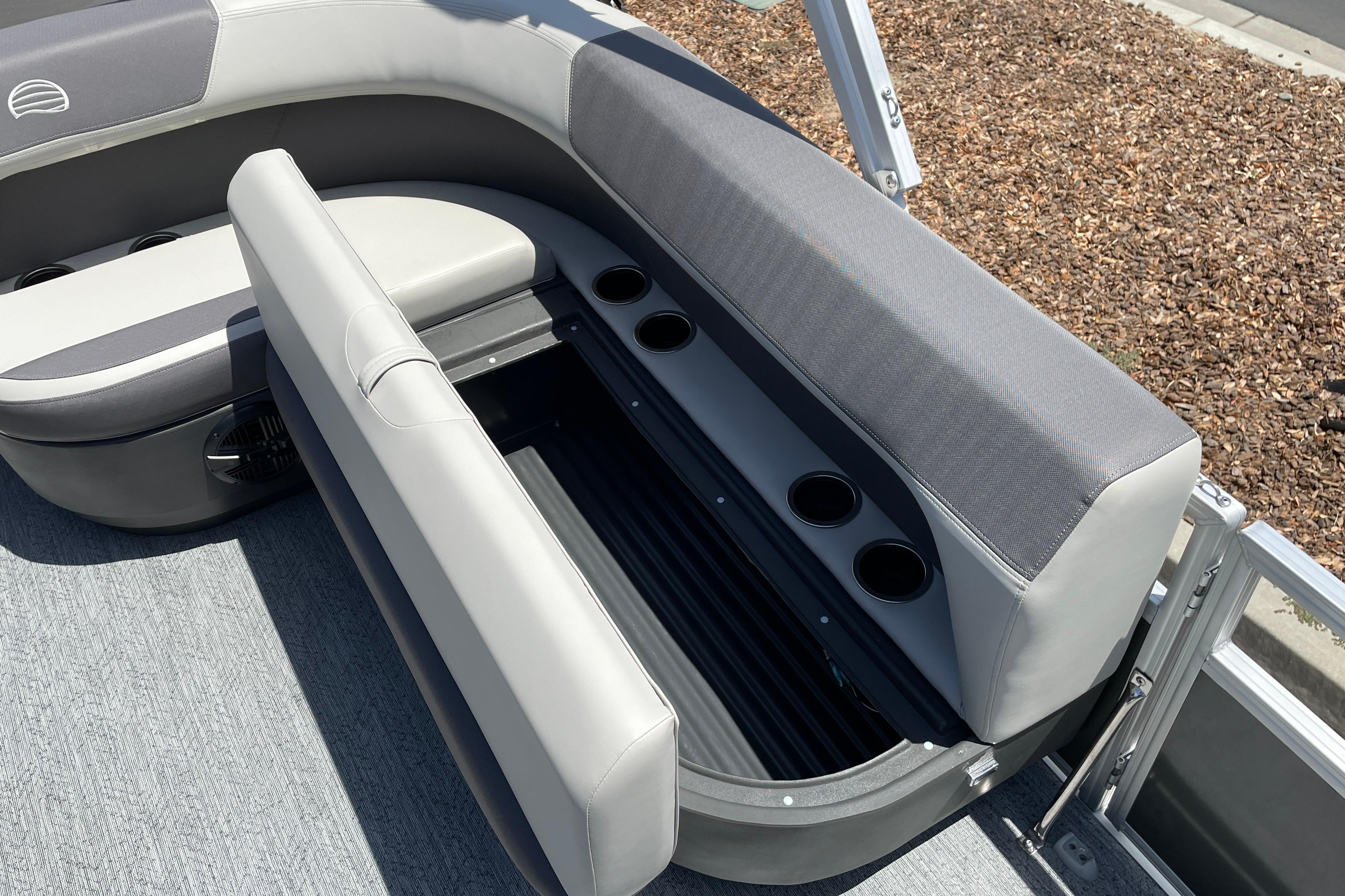 2026 Sun Tracker Bass Buggy 16 XL Select boat seat with storage and cup holders.