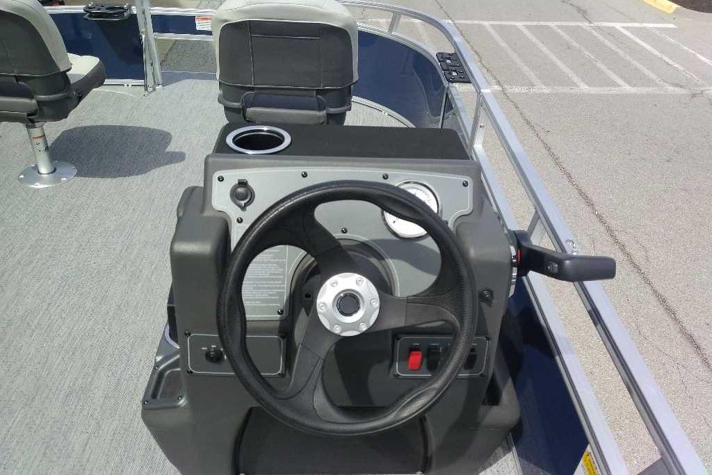 2026 Sun Tracker Bass Buggy 16 XL Select steering console with cup holder and gauges.