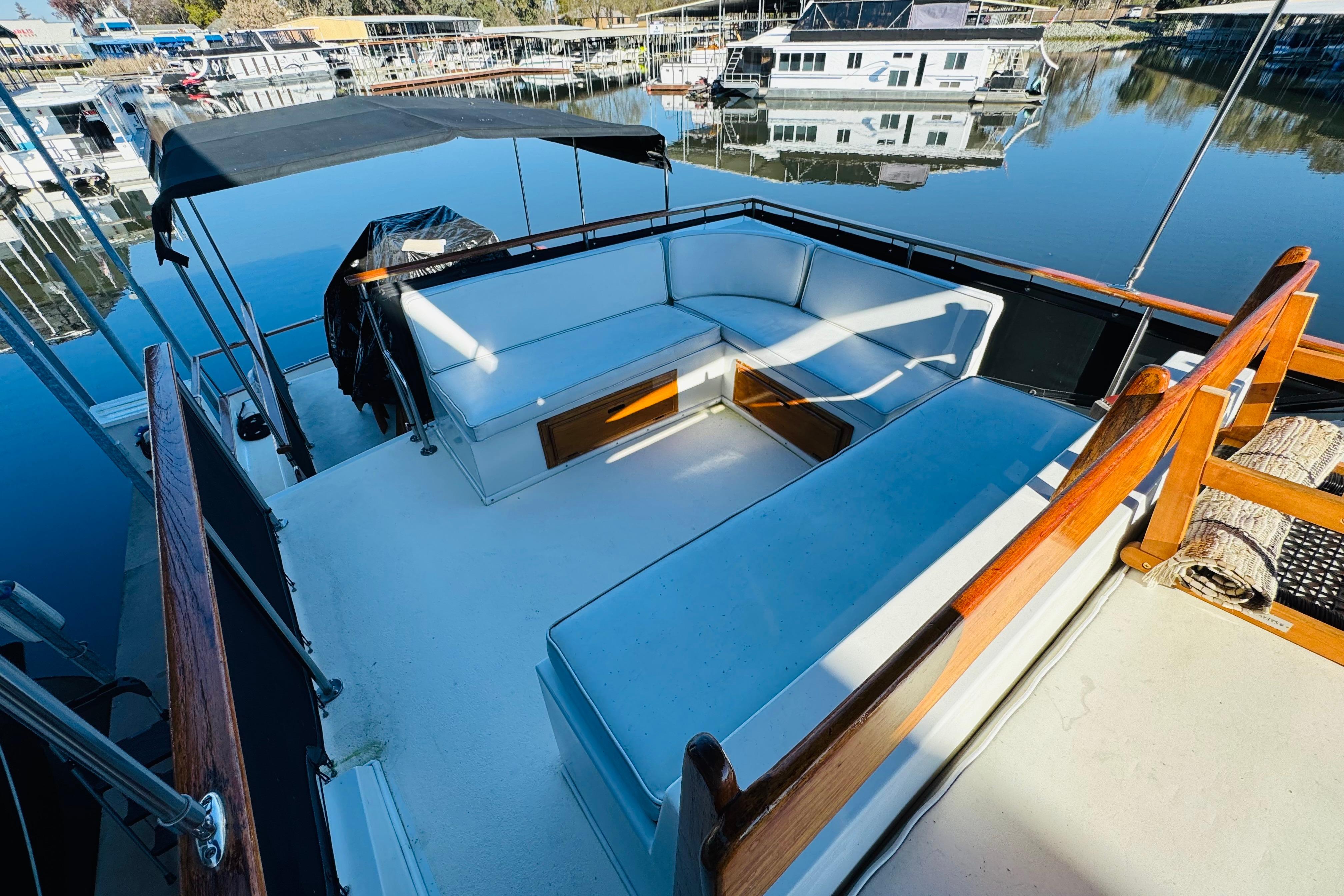 1978 Californian 42 LRC yacht with spacious deck seating, docked at a marina.