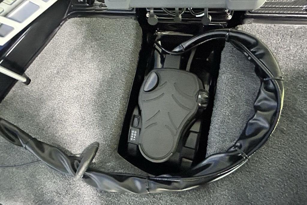 Foot pedal control in 2026 Phoenix 819 ZXL boat, surrounded by protective padding.