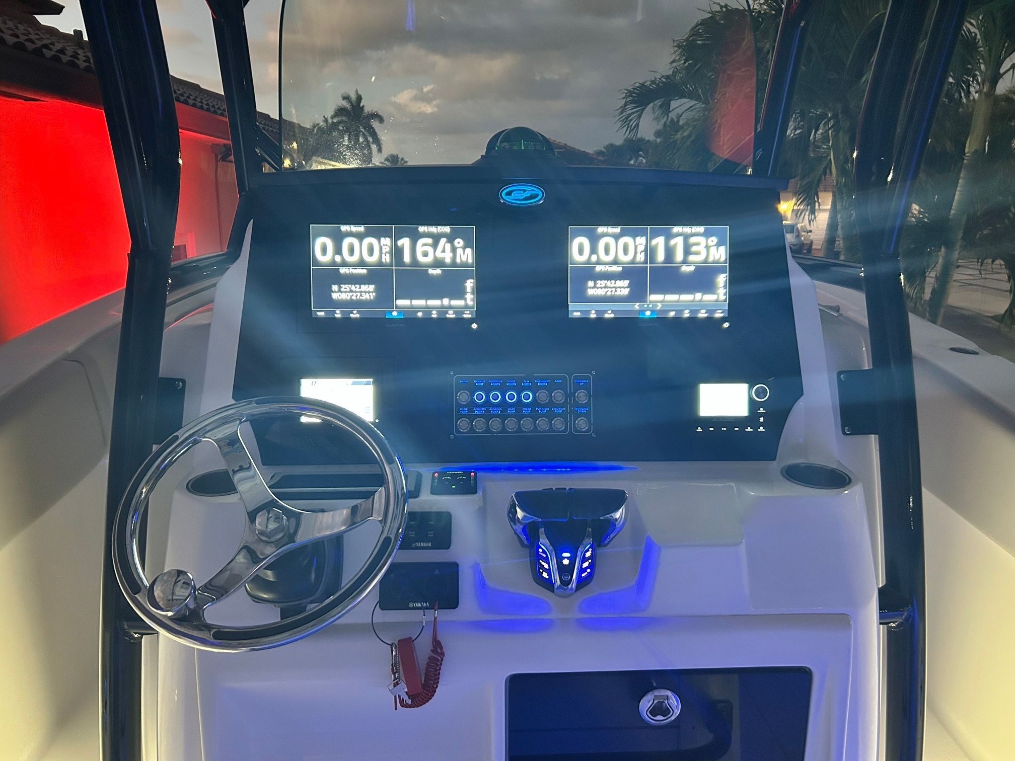The Sea Fox 288 Commander cockpit features modern navigation displays and a sleek steering wheel.