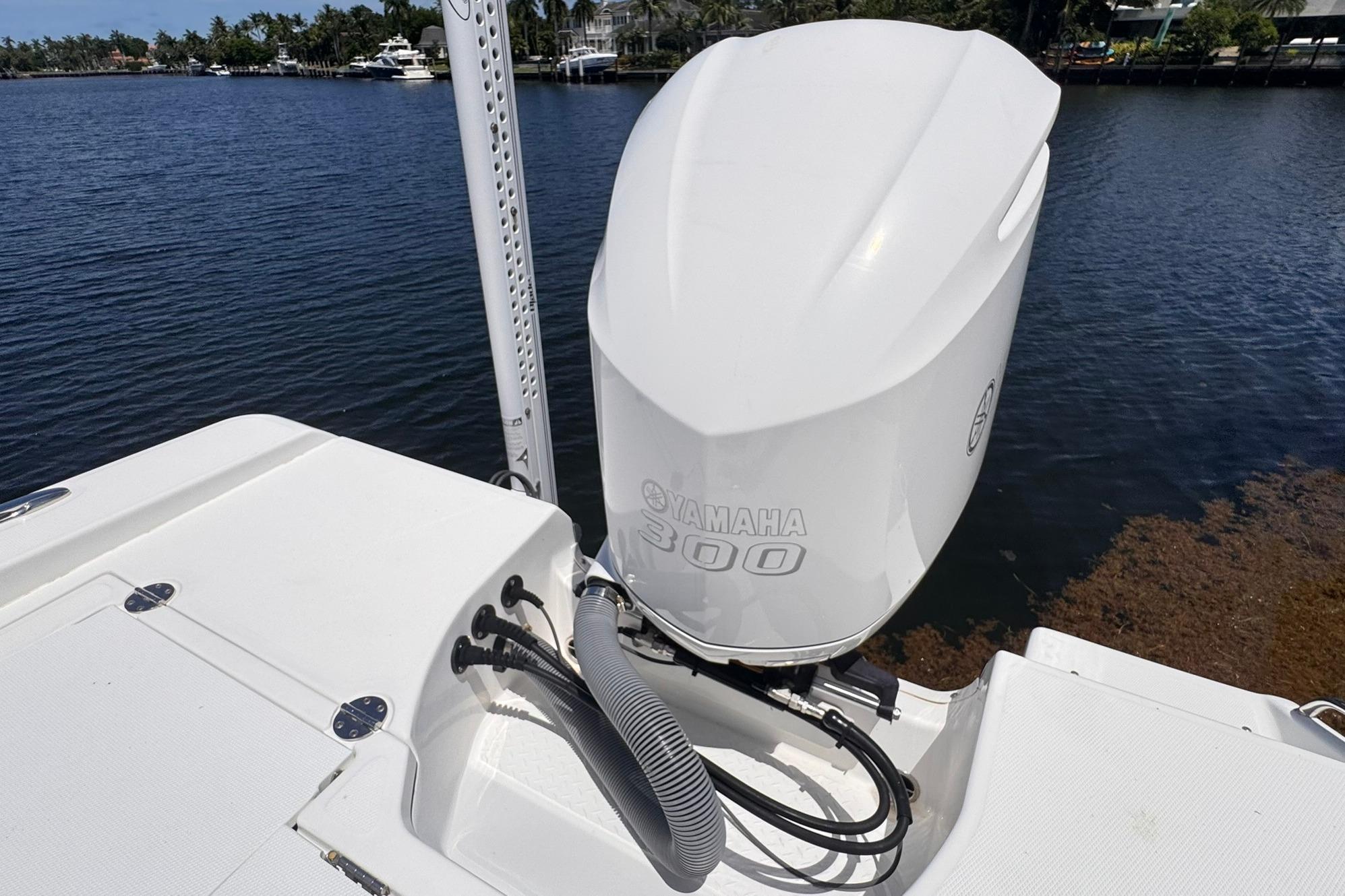 2018 Everglades 253 Center Console with Yamaha 300 engine on calm water.