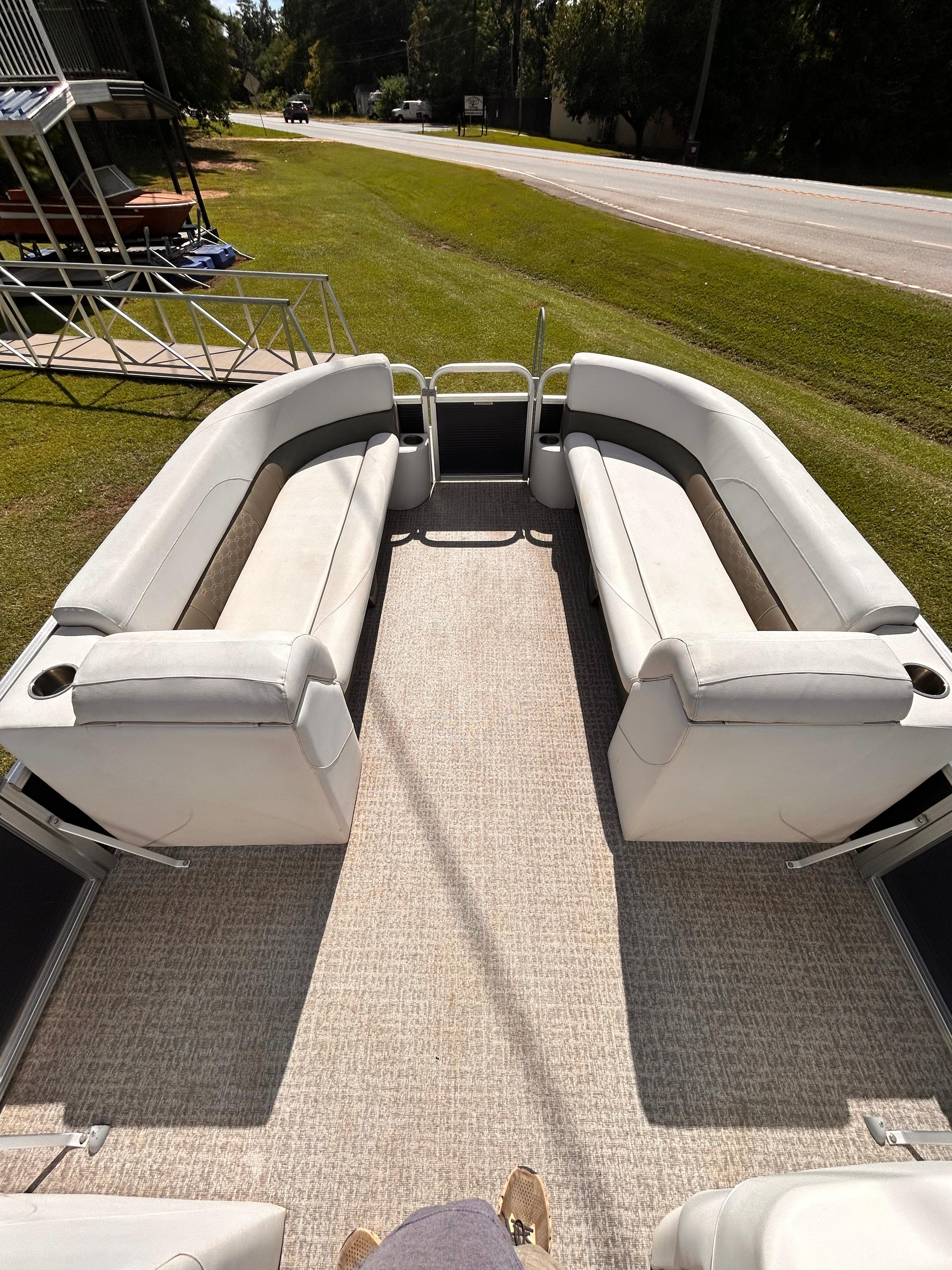 2019 Avalon GS Cruise 25' pontoon boat with spacious seating and carpeted deck.