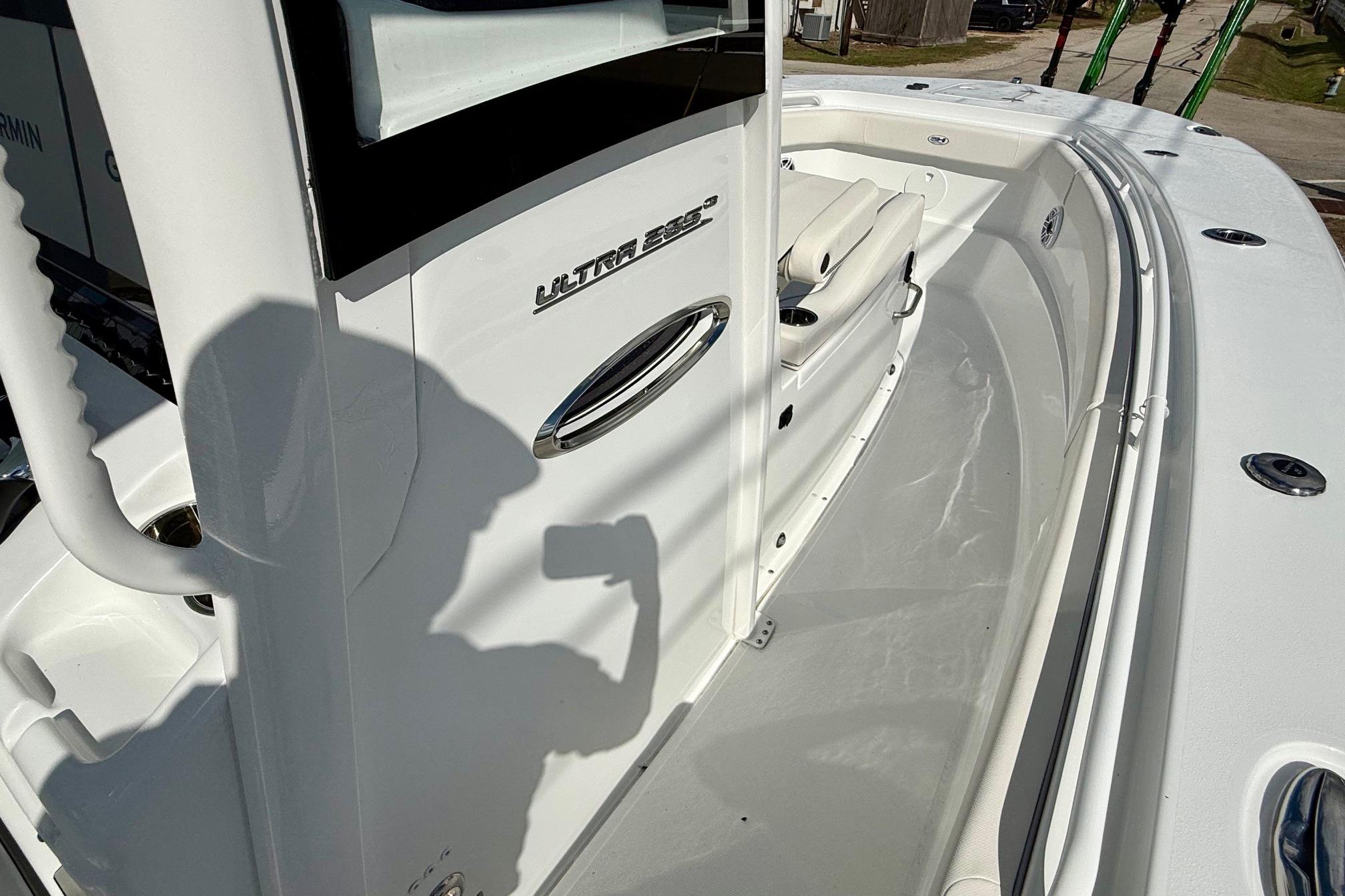 2026 Sea Hunt Ultra 285 Coffin Box boat deck with seating and console.