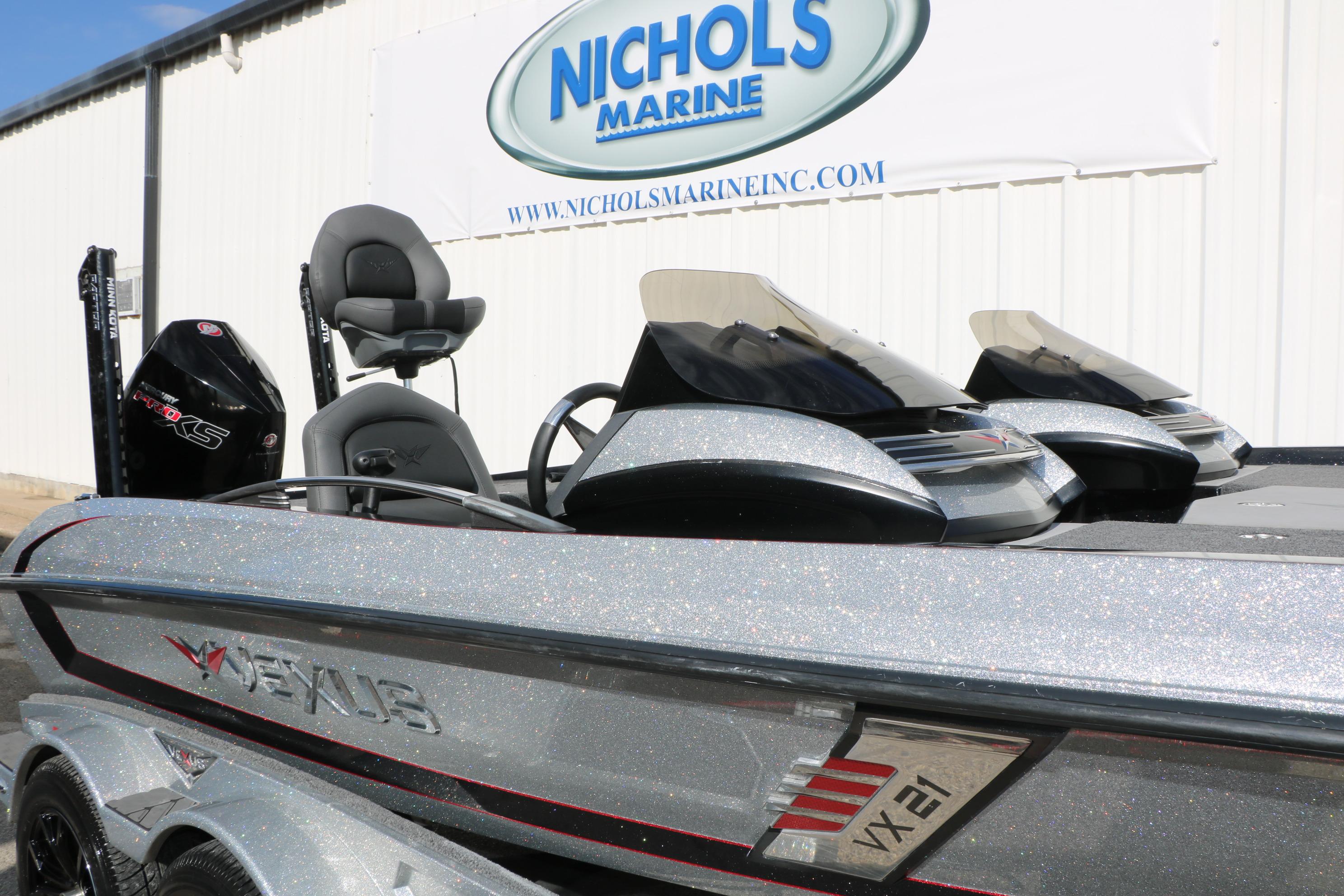 2022 Vexus VX21 boat at Nichols Marine dealership, featuring sleek design and modern equipment.