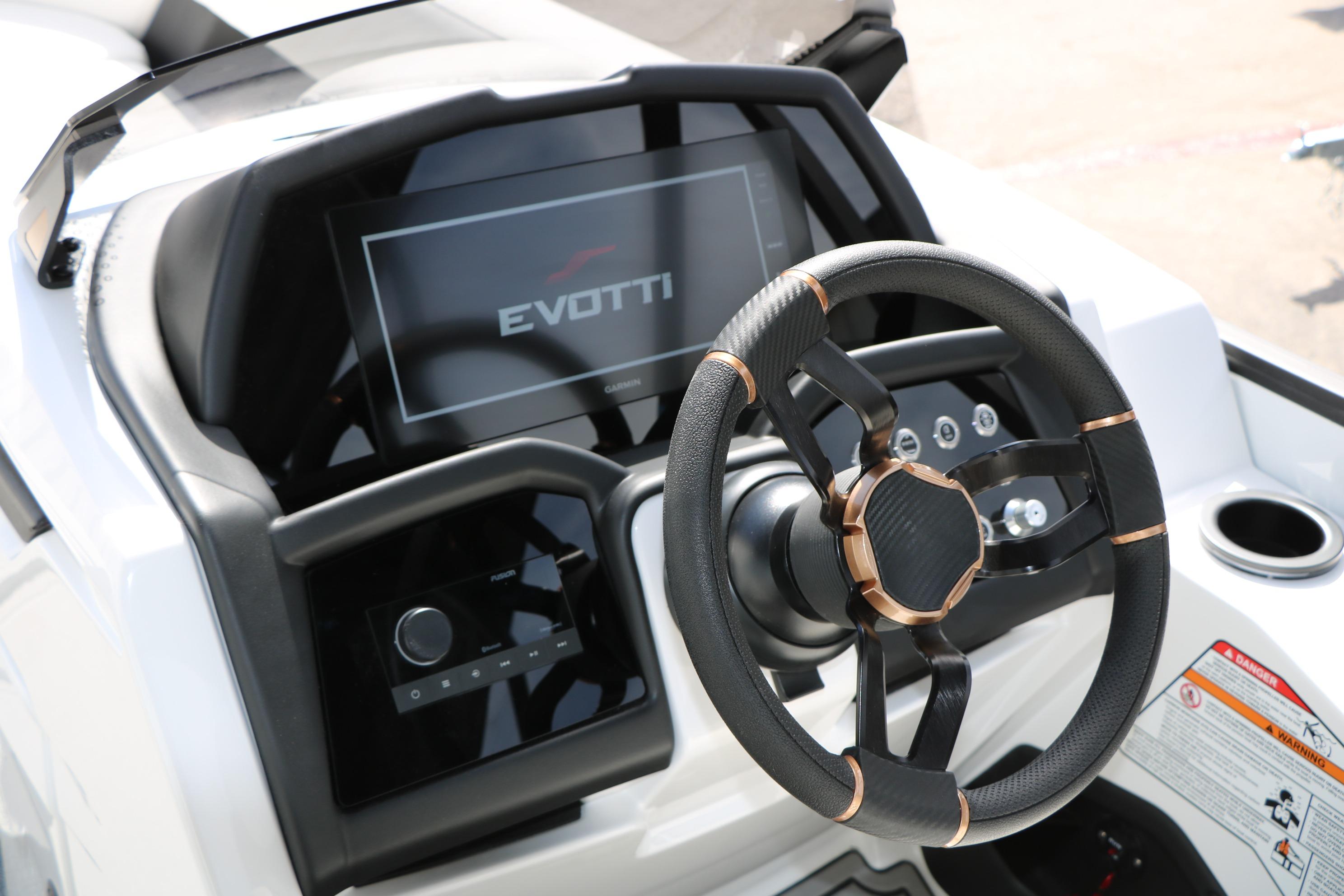 Steering console of 2026 Evotti 725 CS Tri-Toon with modern dashboard and controls.