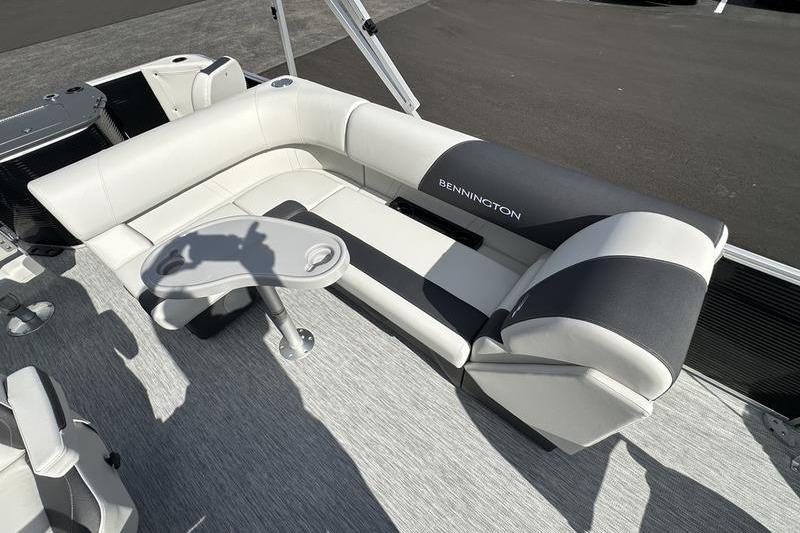 2026 Bennington S 20 SF boat interior with stylish seating and table.