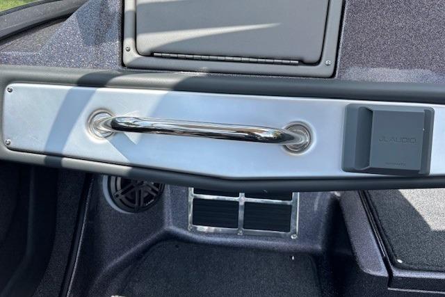 Interior of 2026 Ranger 212LS boat featuring a sleek dashboard handle and speaker.