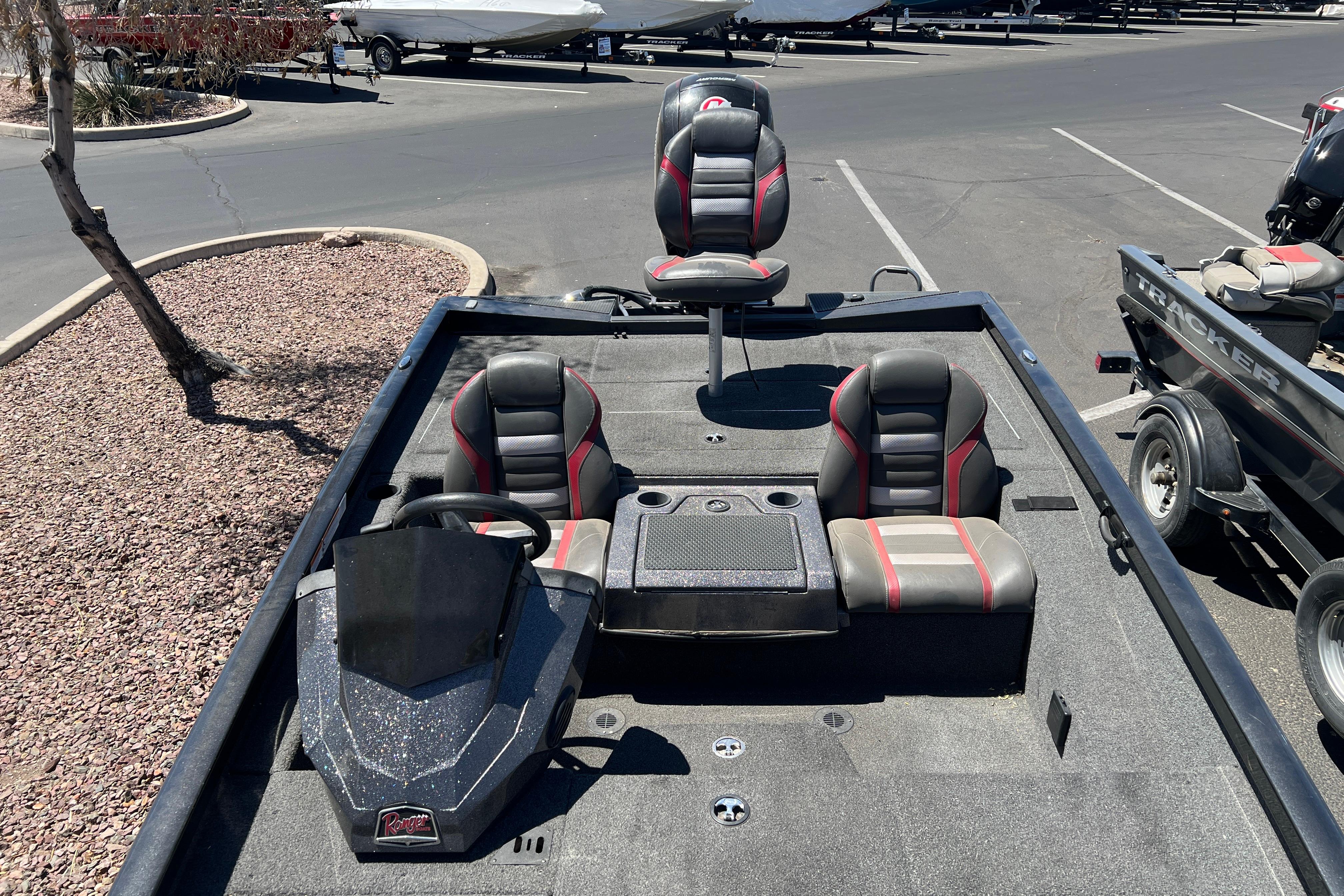 2019 Ranger RT198P fishing boat interior with three seats and steering console.