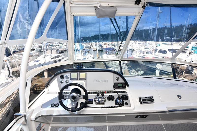 Helm of 2008 Carver 43 Super Sport yacht with Garmin navigation system.