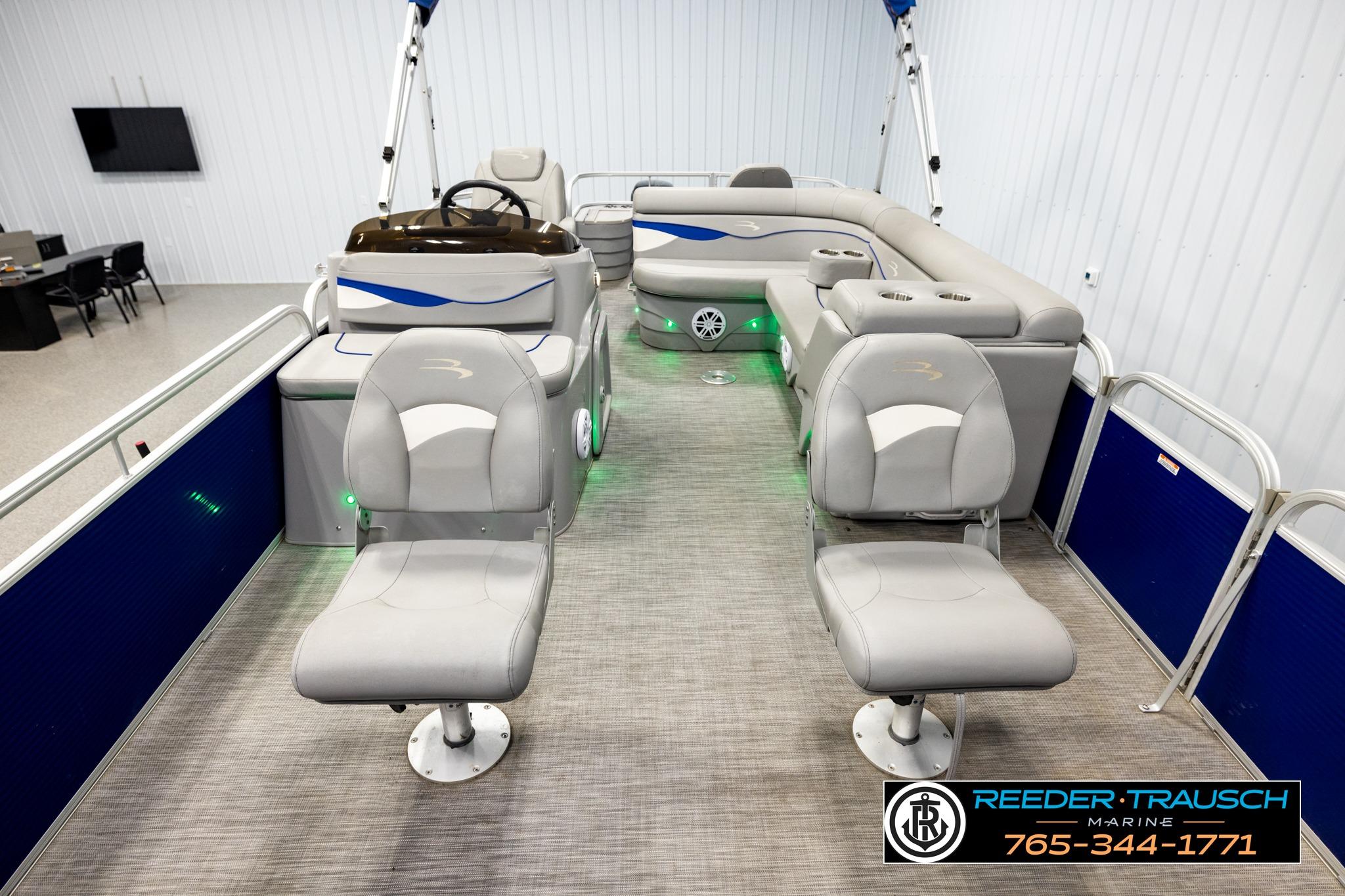 2021 Bennington 20 SV pontoon boat interior with gray seating and modern design.